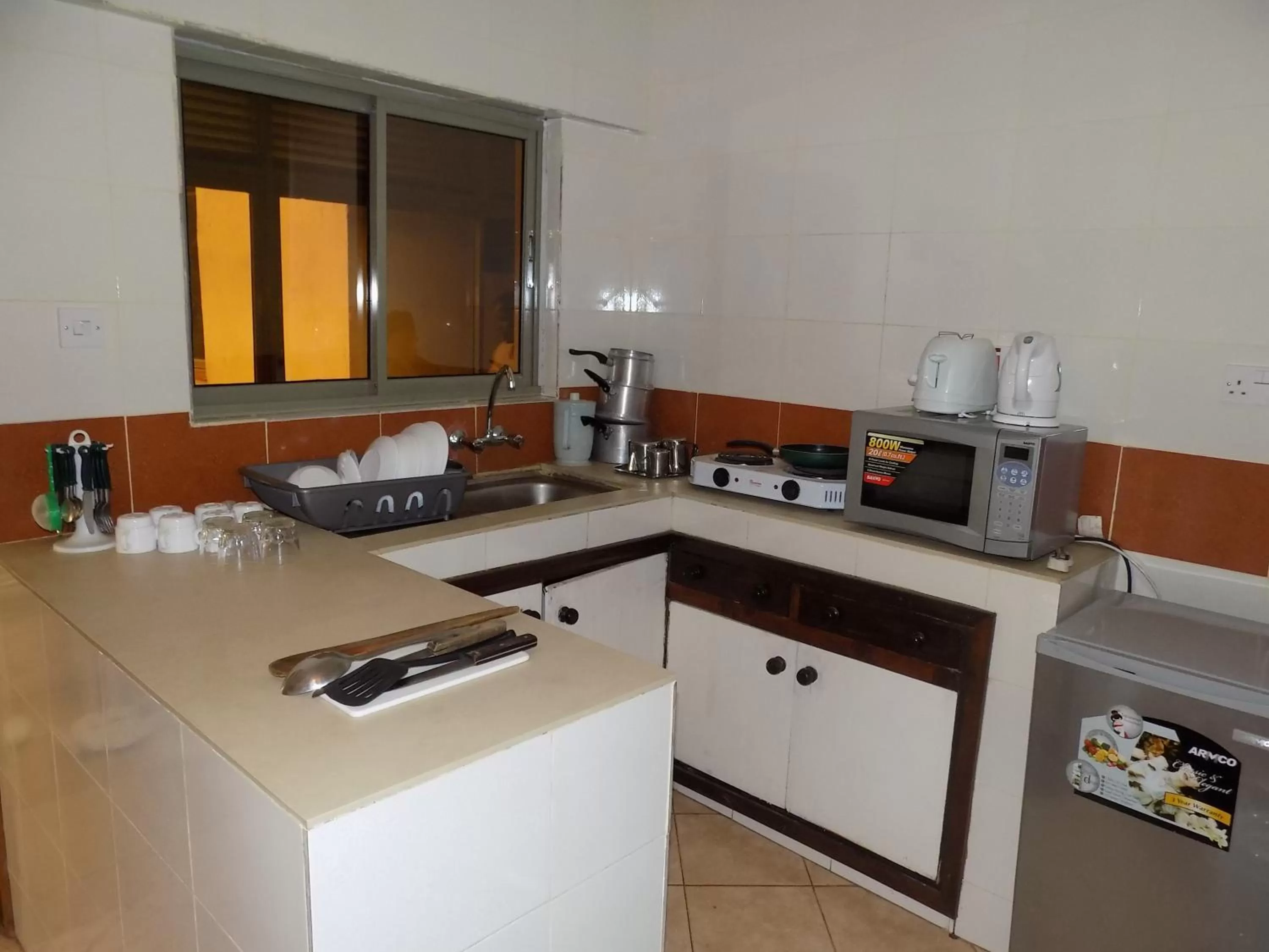 Kitchen or kitchenette in Kenya Comfort Suites