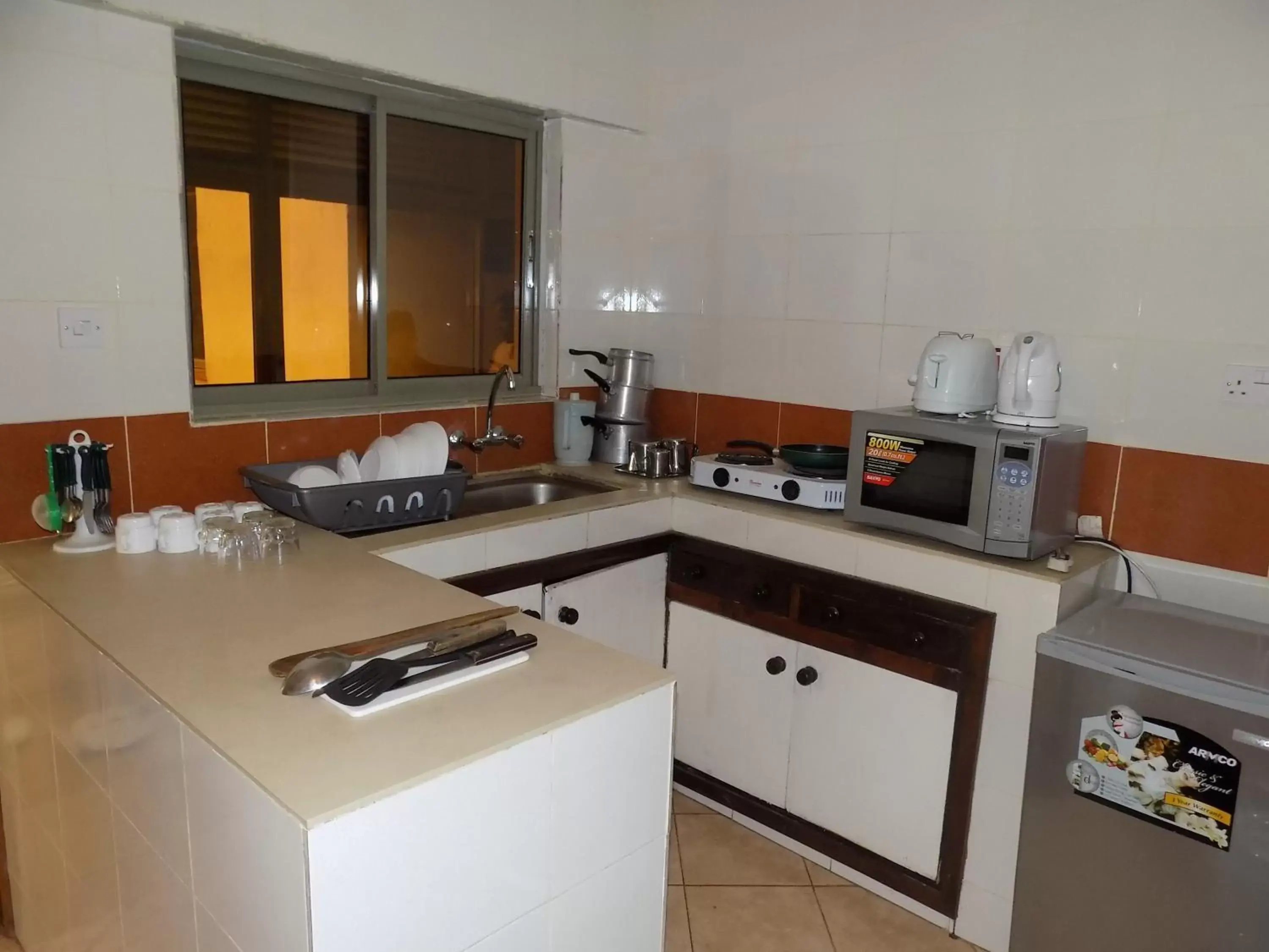 Kitchen or kitchenette, Kitchen/Kitchenette in Kenya Comfort Suites