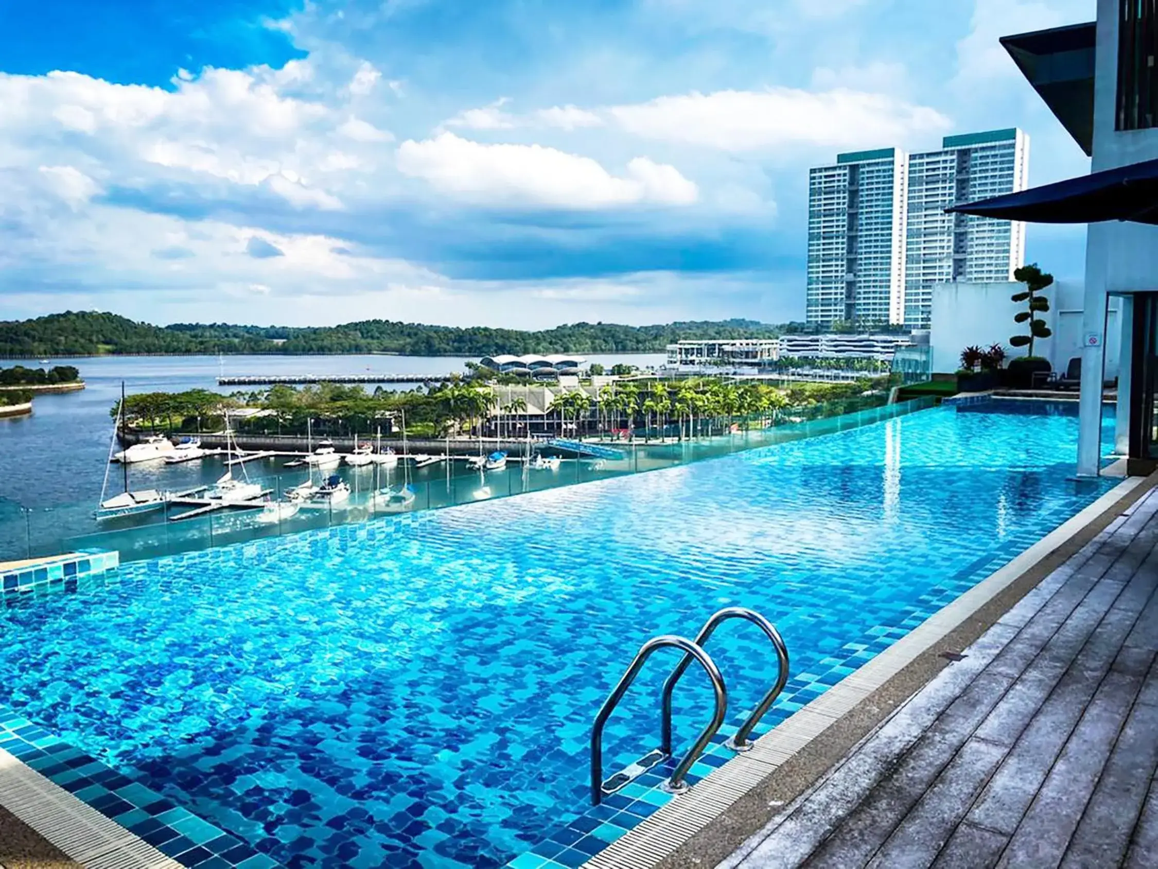 Swimming pool in Trinidad Suites Johor, Trademark Collection by Wyndham Swimming pool in Trinidad Suites Johor, Trademark Collection by Wyndham