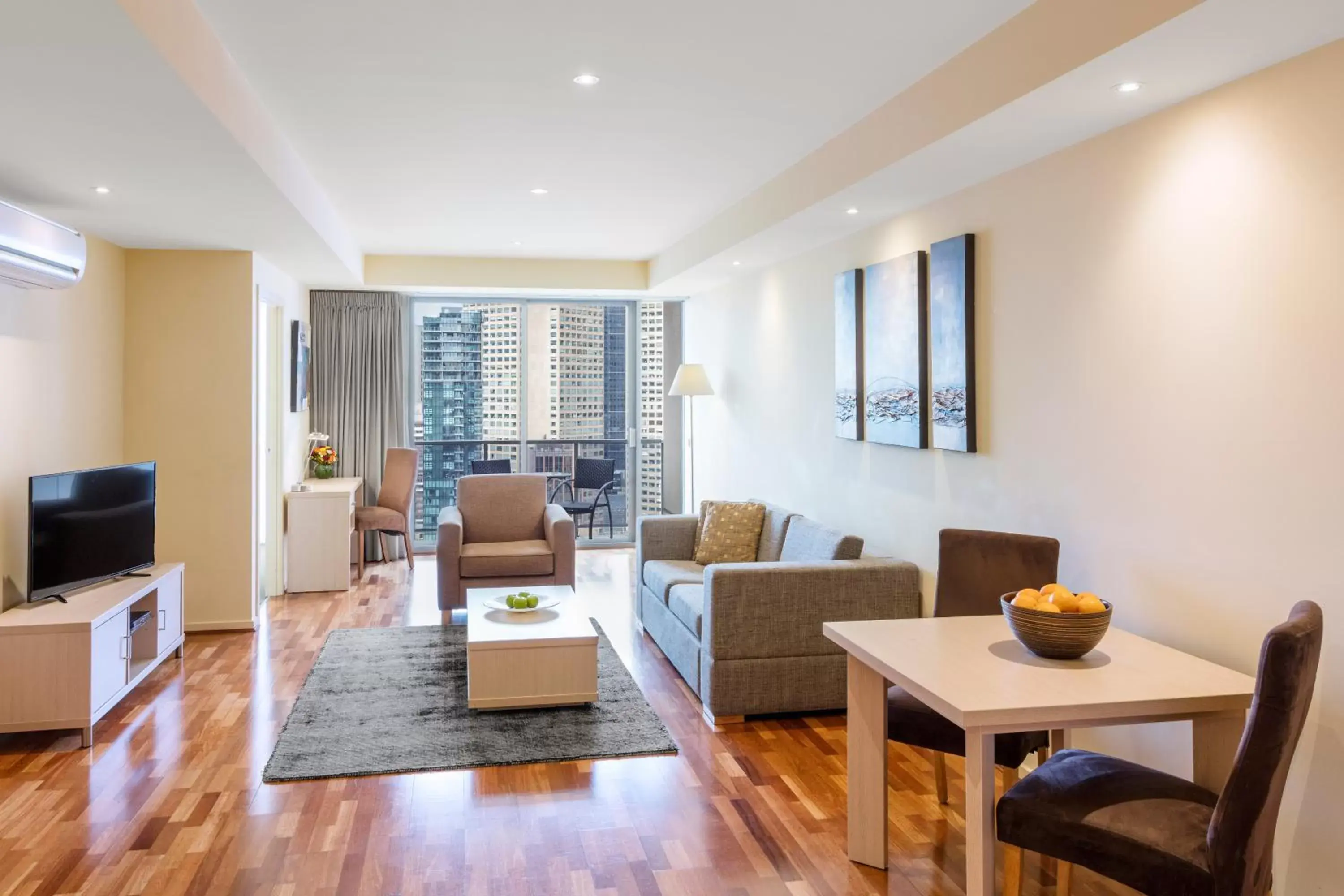 TV and multimedia, Dining Area in Oaks Melbourne on Lonsdale Suites