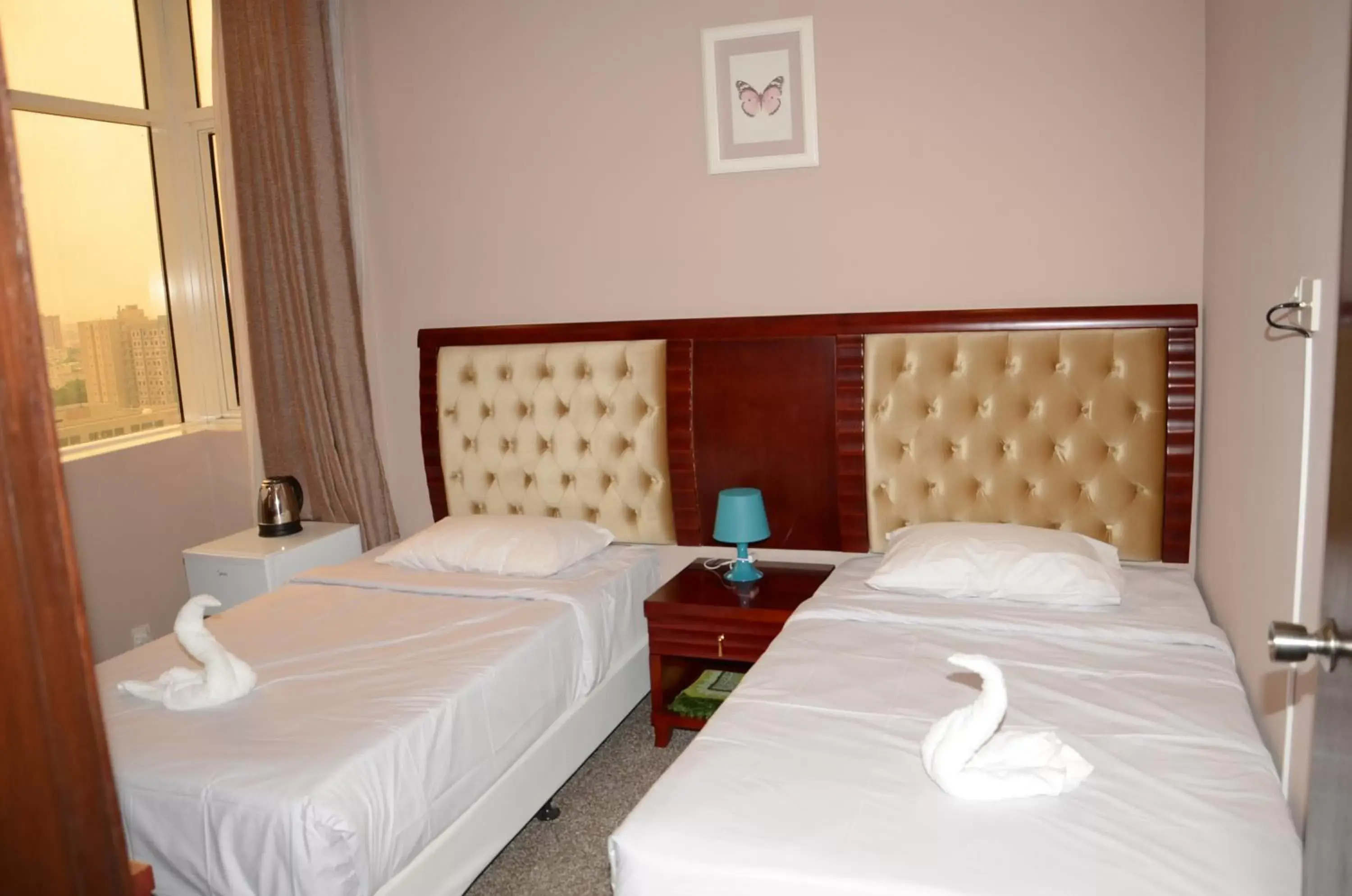 Photo of the whole room, Bed in Continental Inn Hotel Al Farwaniya