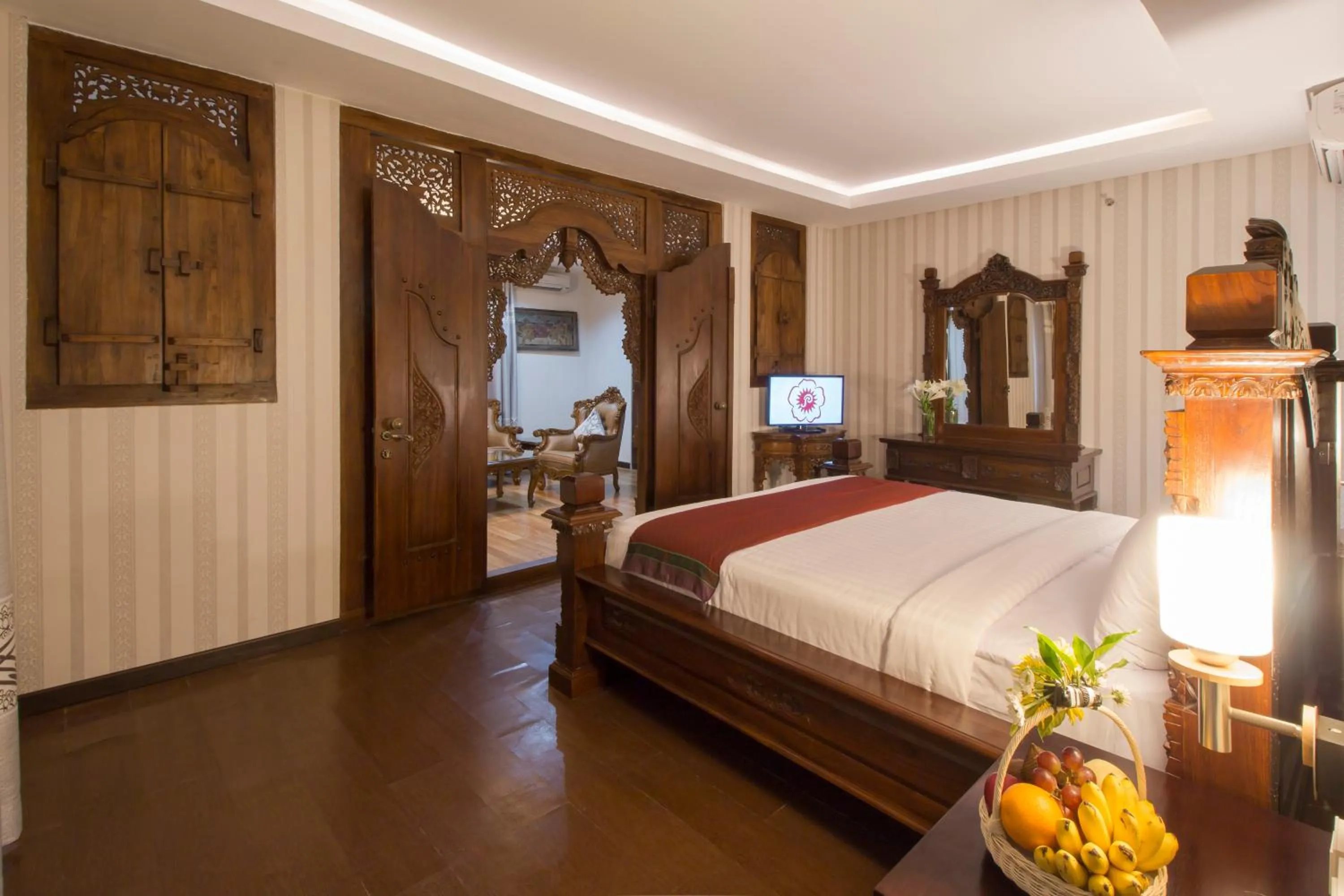 Bed in Grand Puri Saron Hotel Yogyakarta