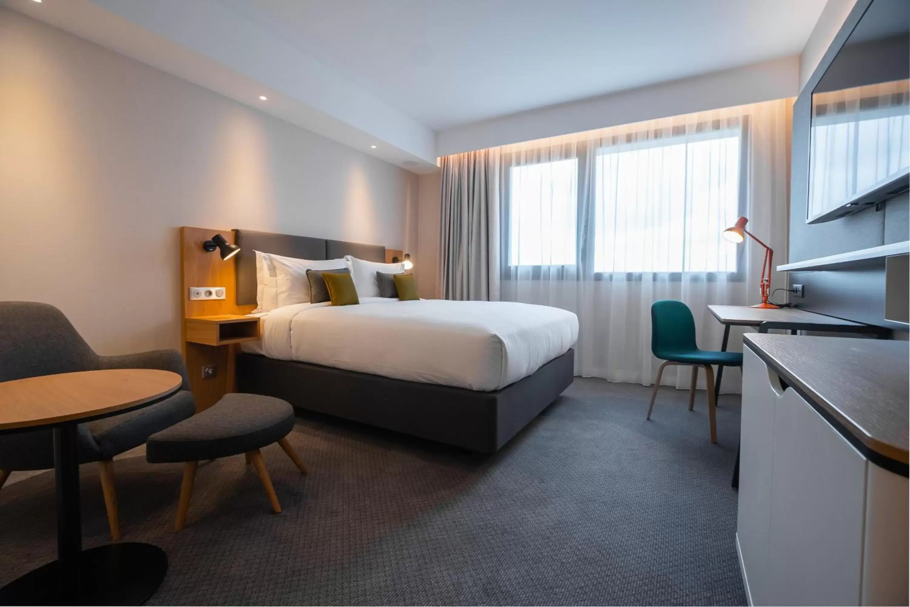 Bedroom in Holiday Inn Paris CDG Airport an IHG Hotel