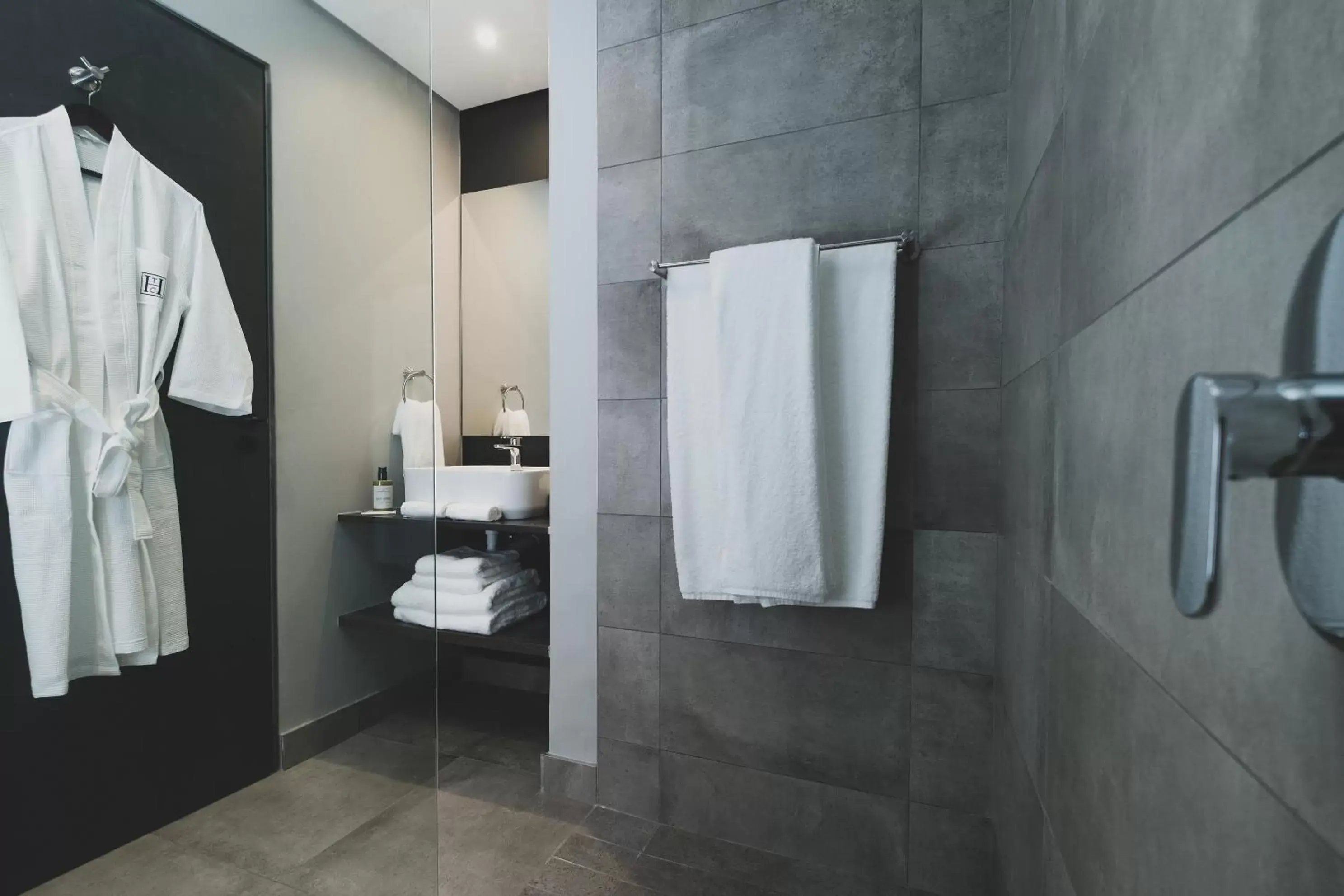 Shower, Bathroom in The Catalyst Apartment Hotel by NEWMARK