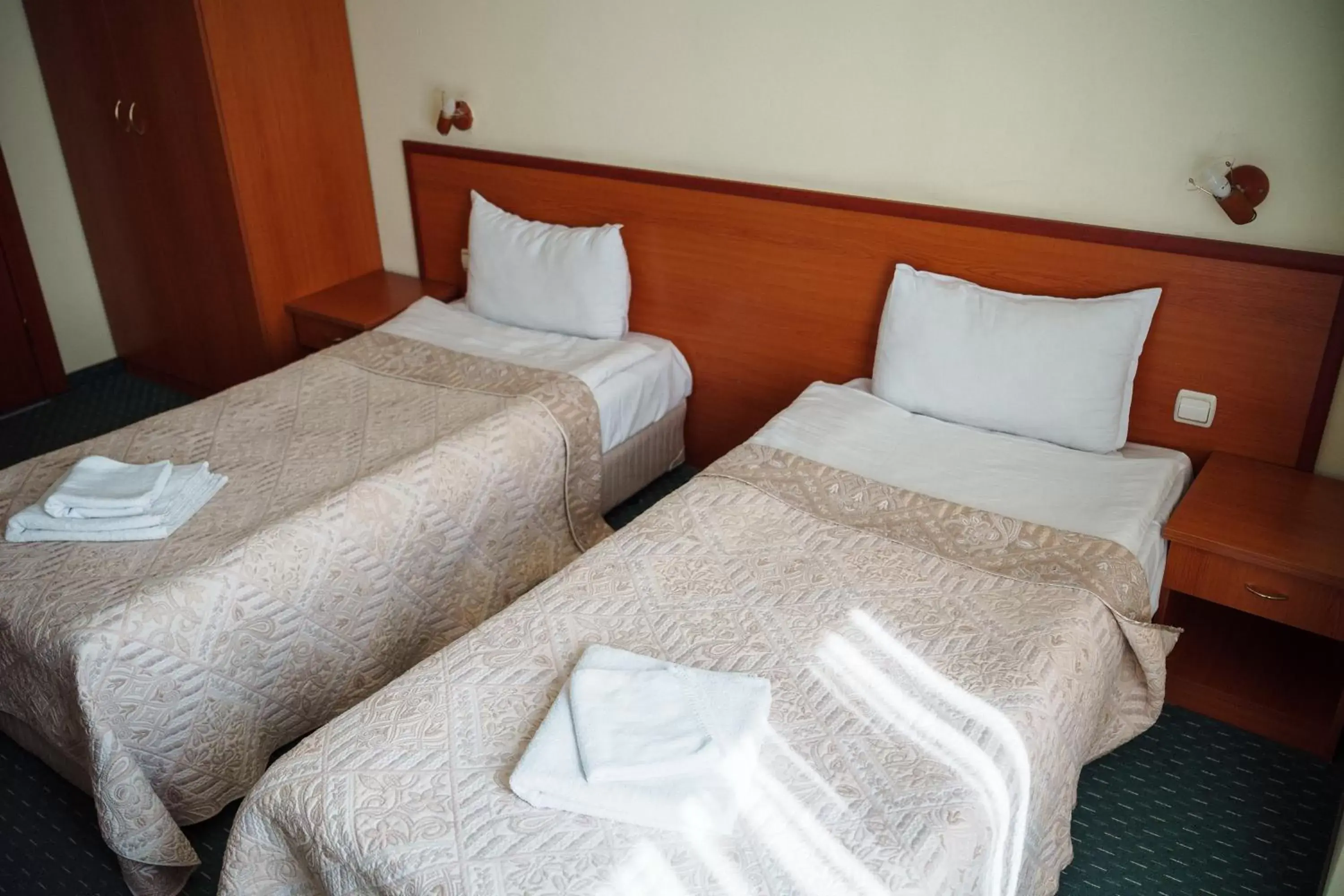 Bed in Dionis Hotel