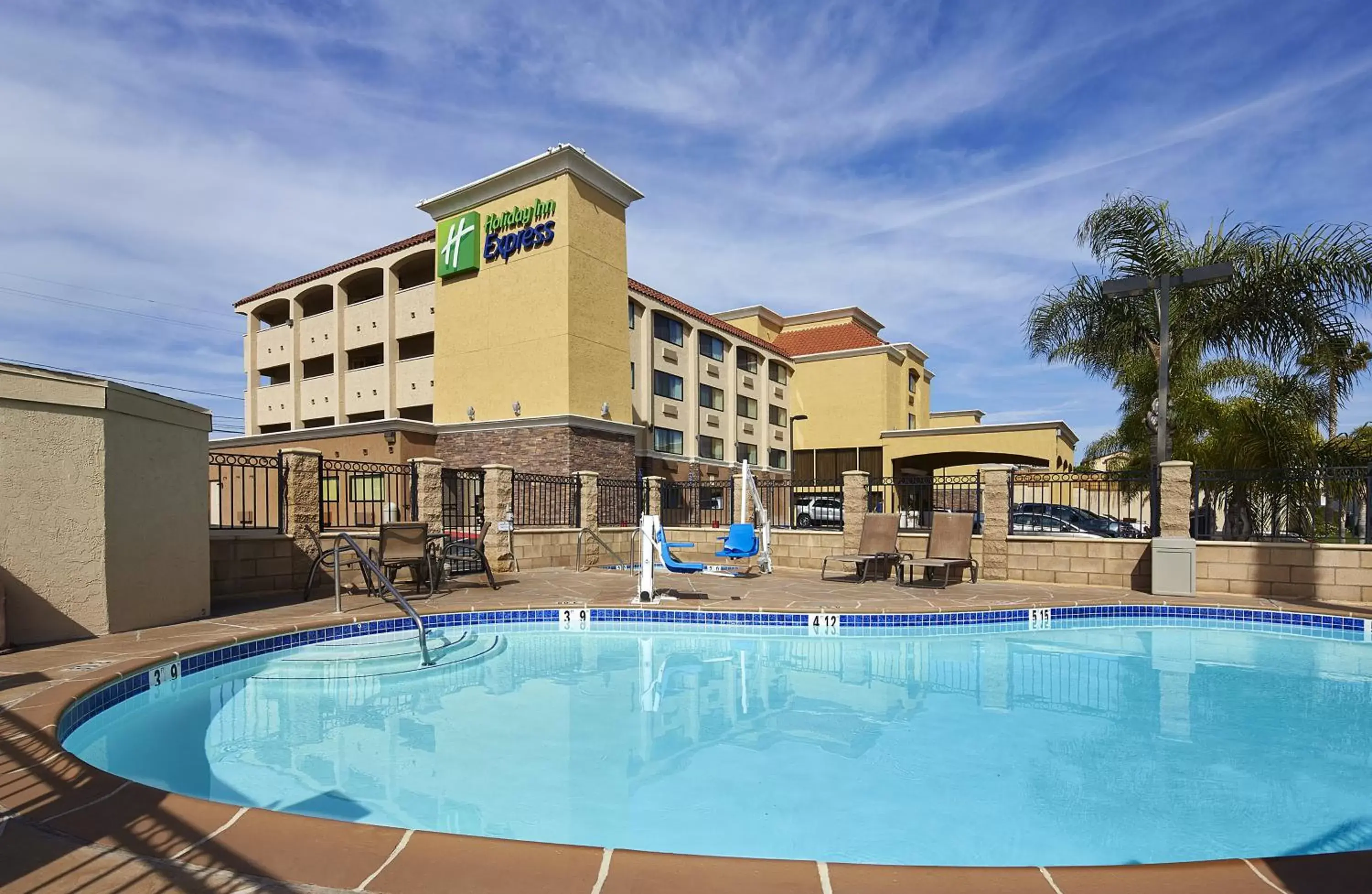 Swimming pool, Property Building in Holiday Inn Express San Diego South - National City, an IHG Hotel