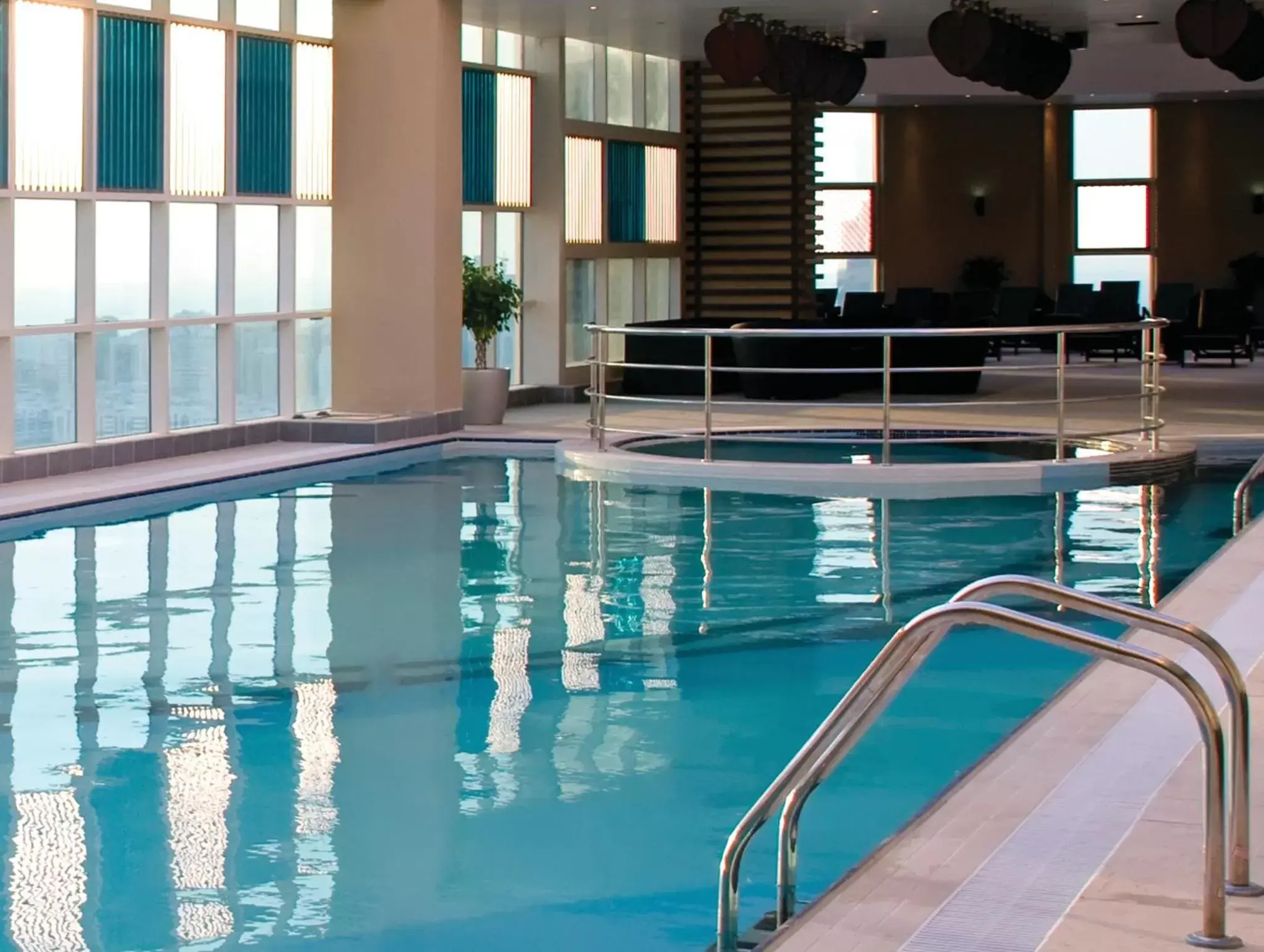 Fitness centre/facilities, Swimming Pool in Grand Millennium Al Wahda Hotel and Executive Apartments Abu Dhabi