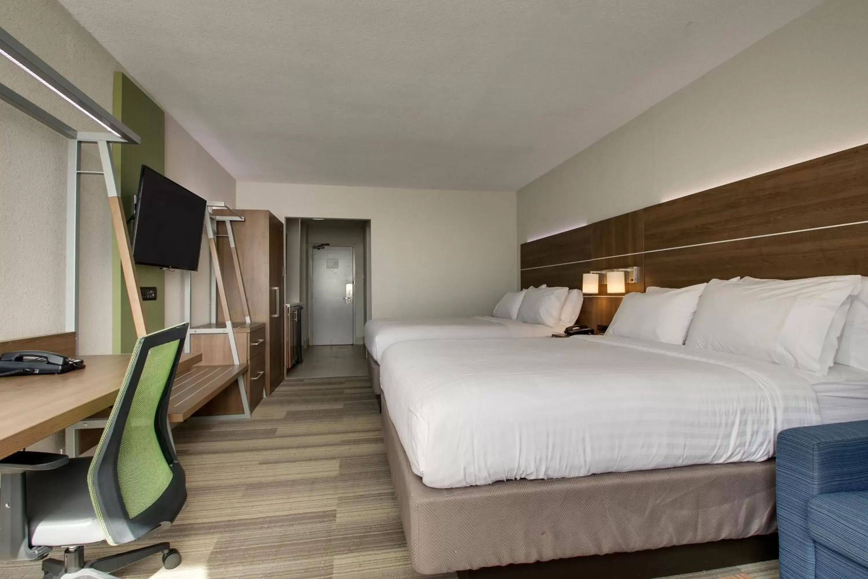 Bedroom in Holiday Inn Express & Suites Wapakoneta, an IHG Hotel