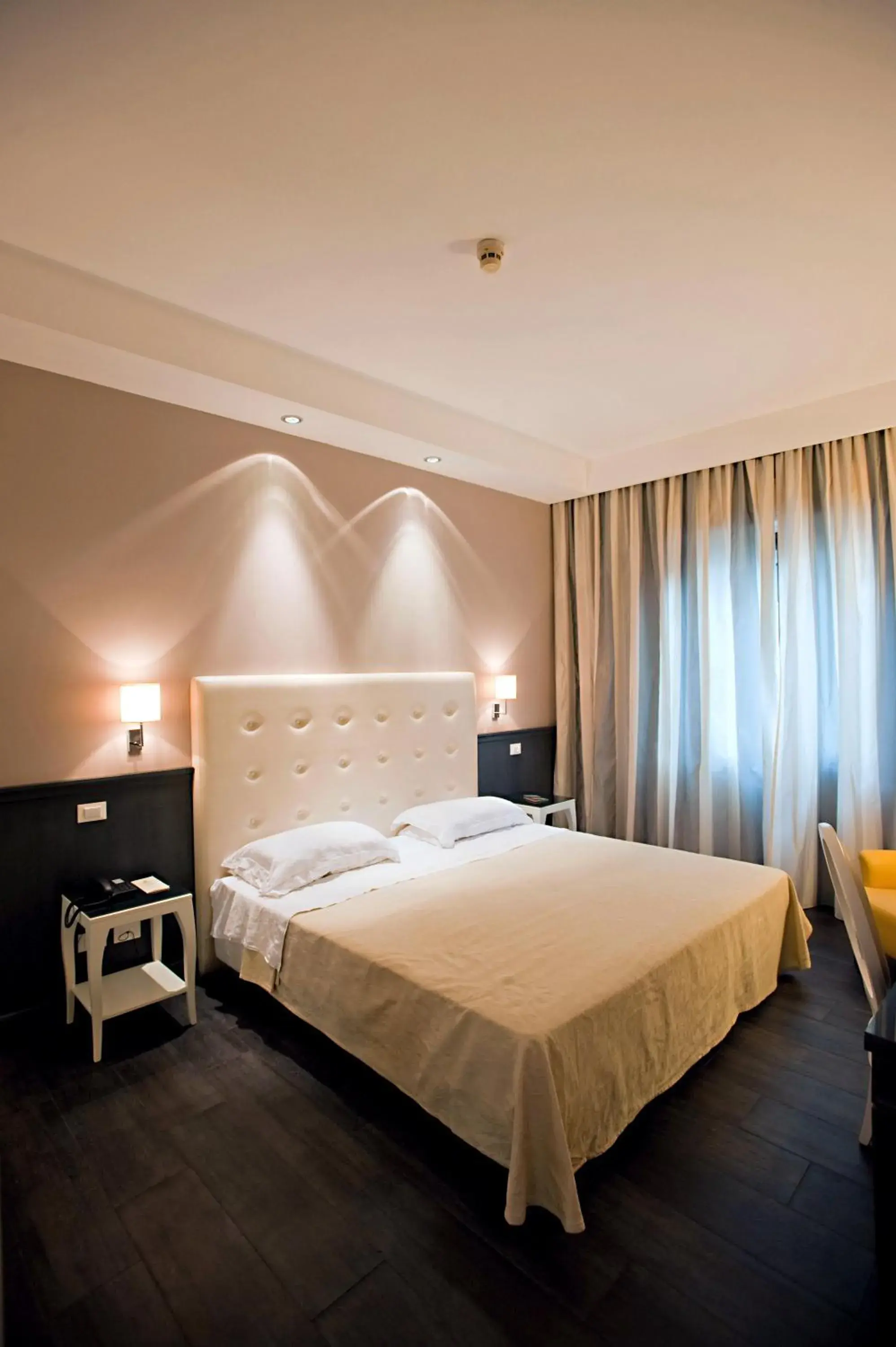 Bed in Hotel Mediterraneo