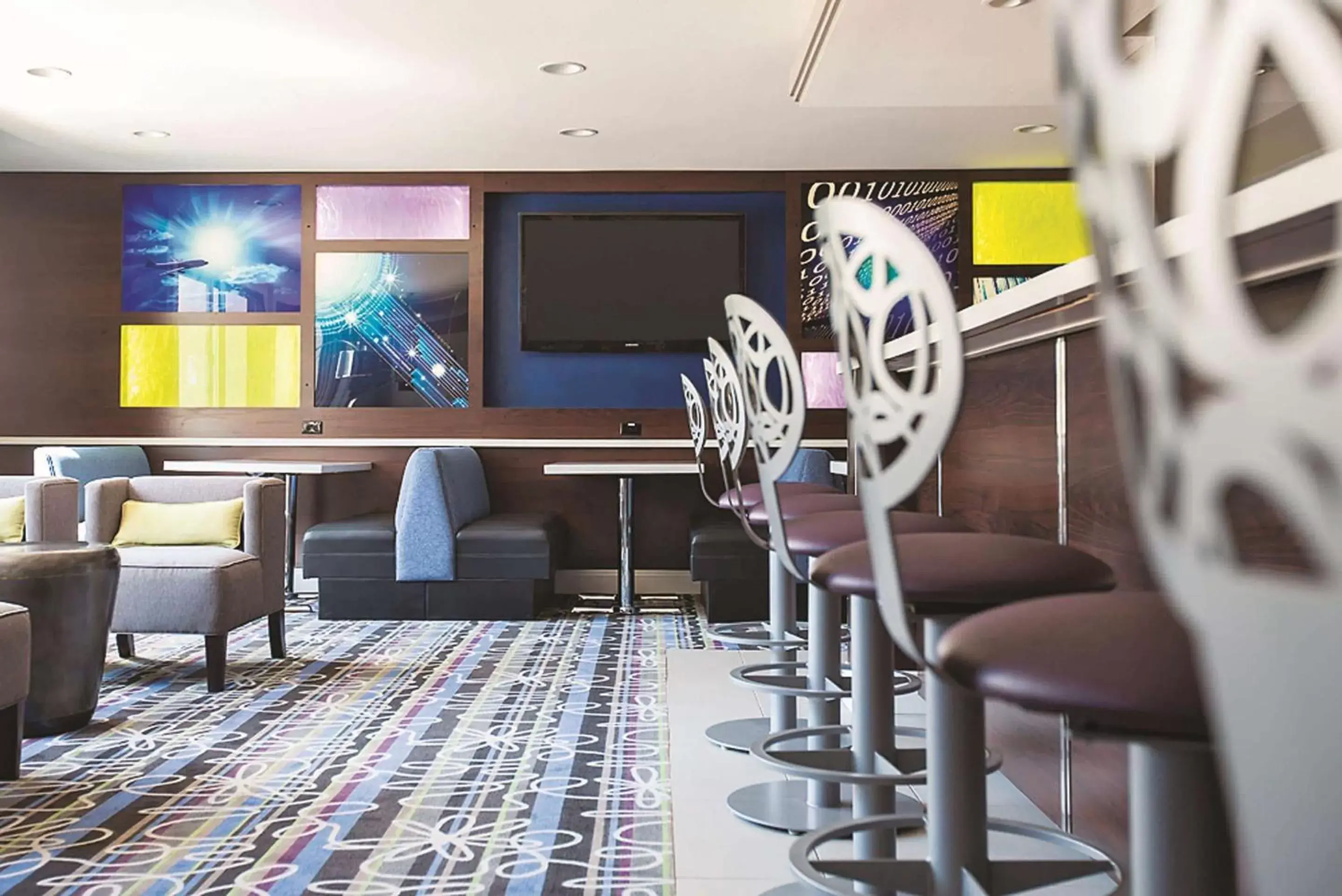 Lobby or reception in La Quinta by Wyndham San Jose Airport