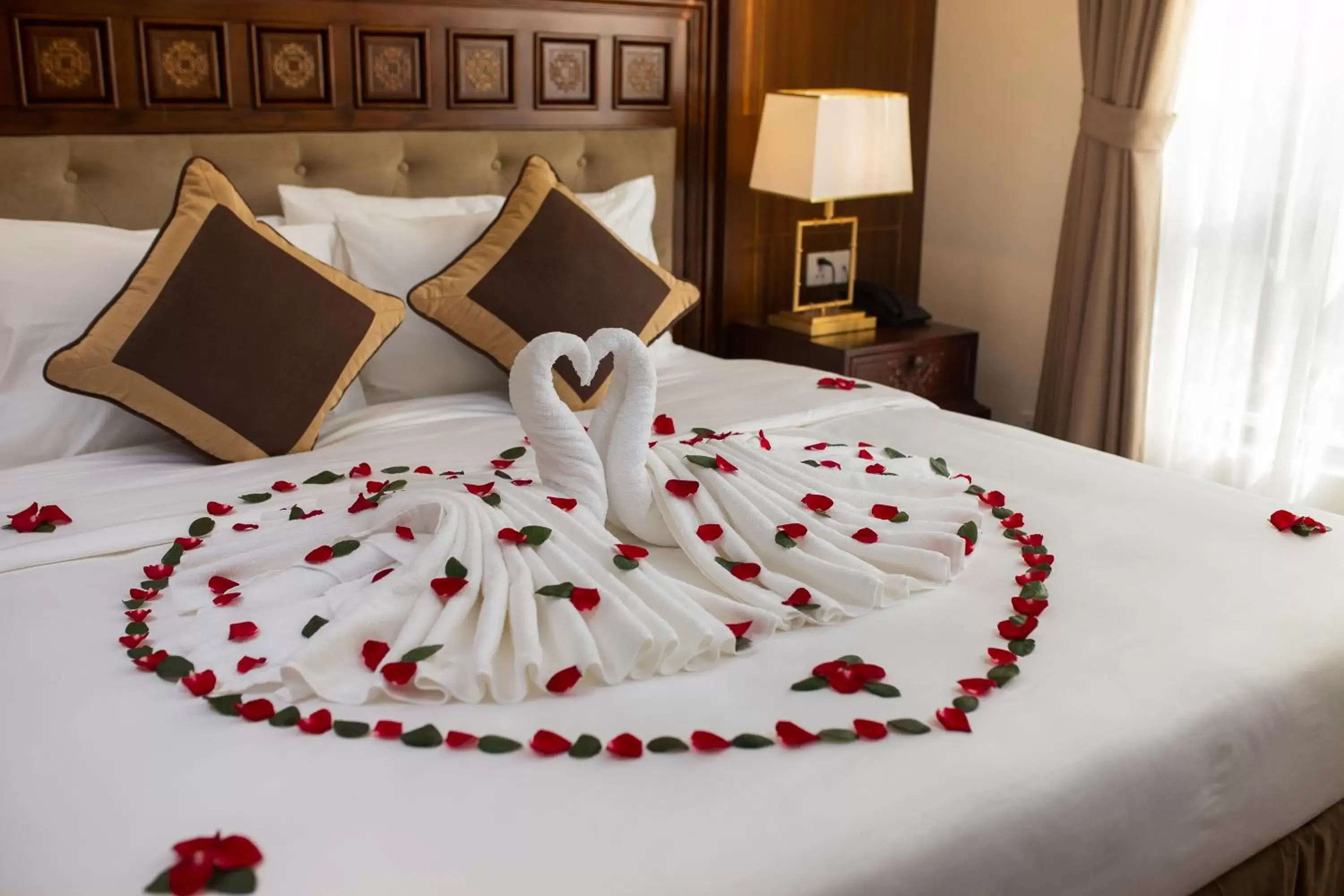 Bed in Rex Hanoi Hotel