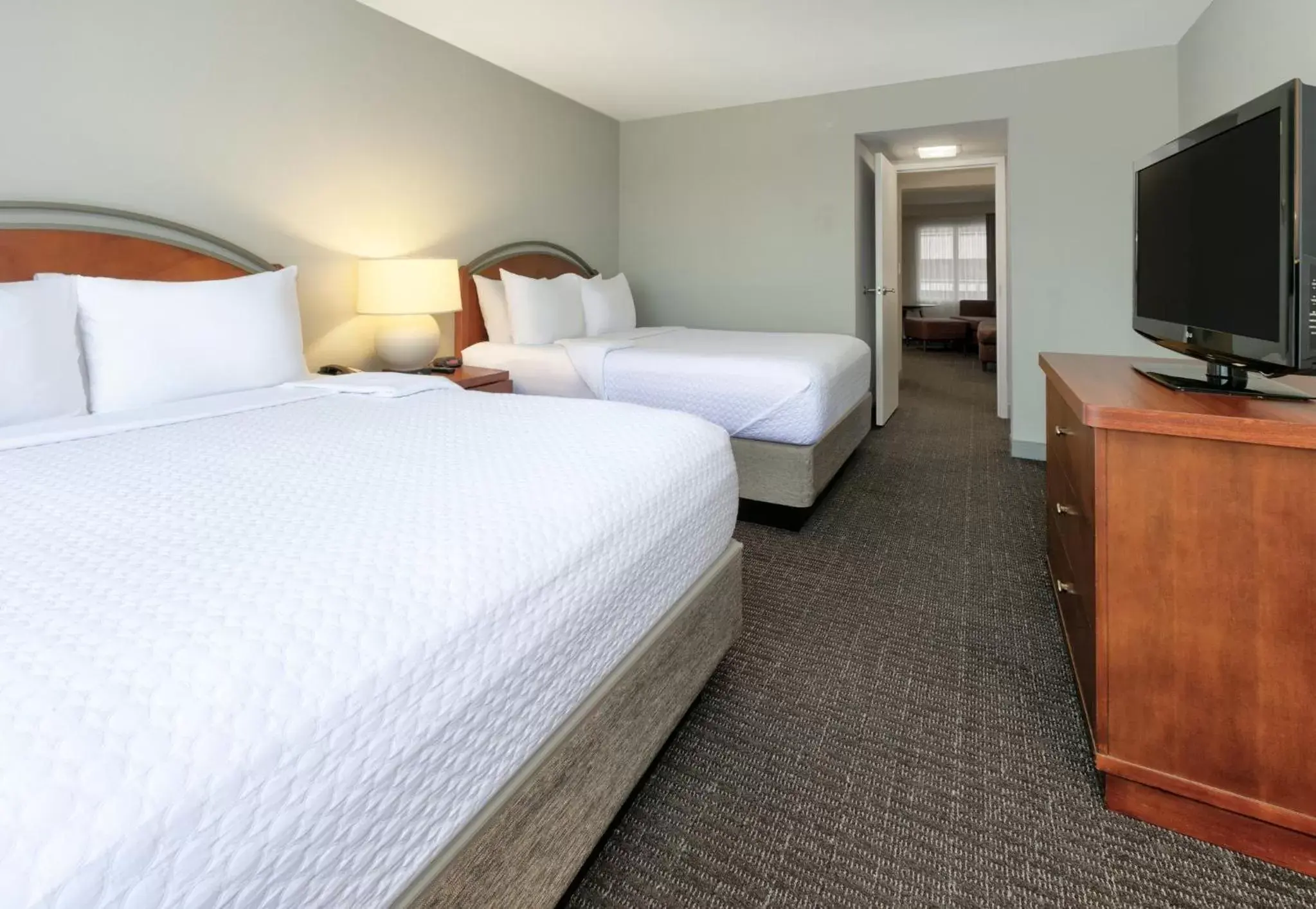 Photo of the whole room, Bed in Crowne Plaza Suites Arlington, an IHG Hotel