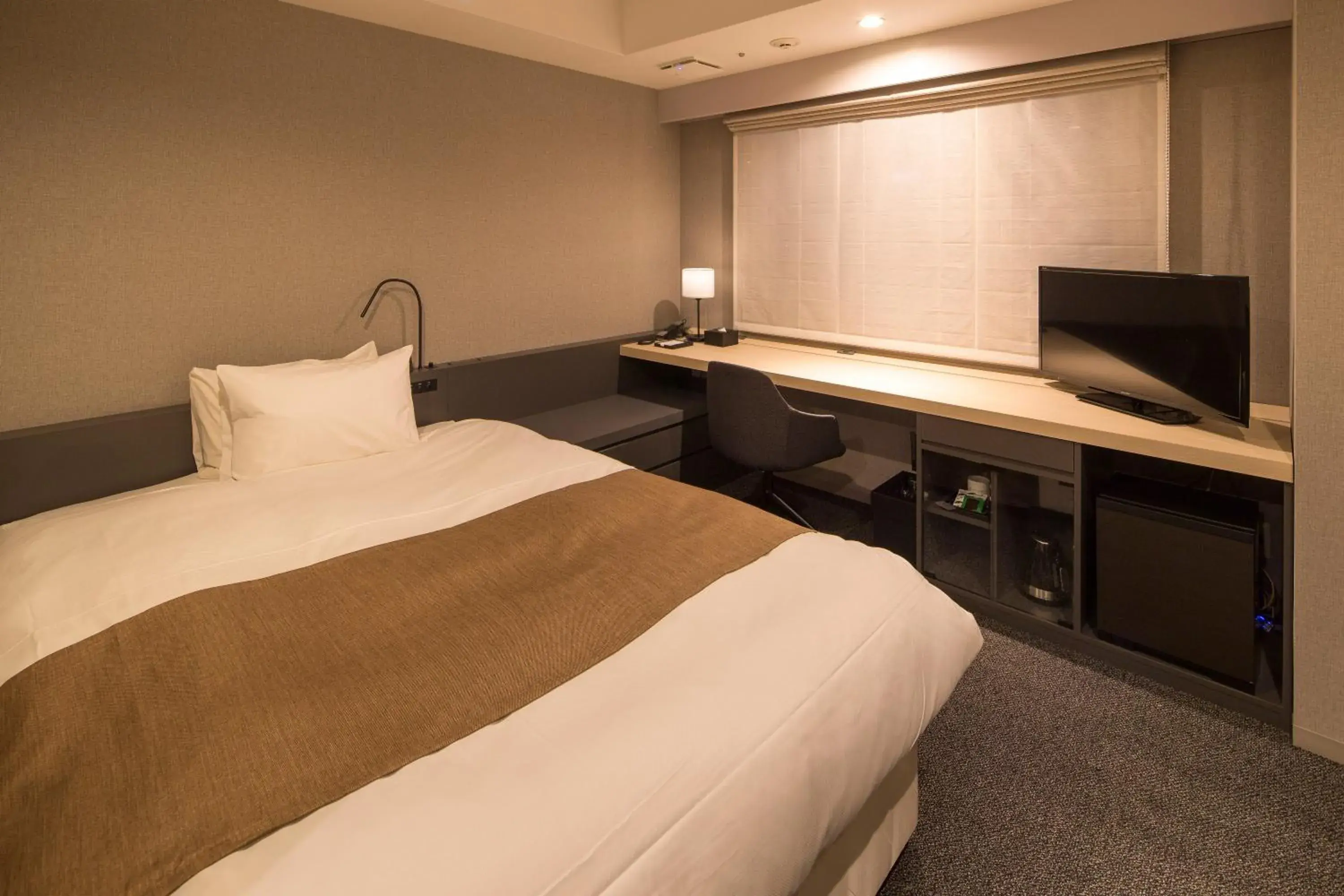 Bed in Hotel Granbinario Komatsu Bed in Hotel Granbinario Komatsu