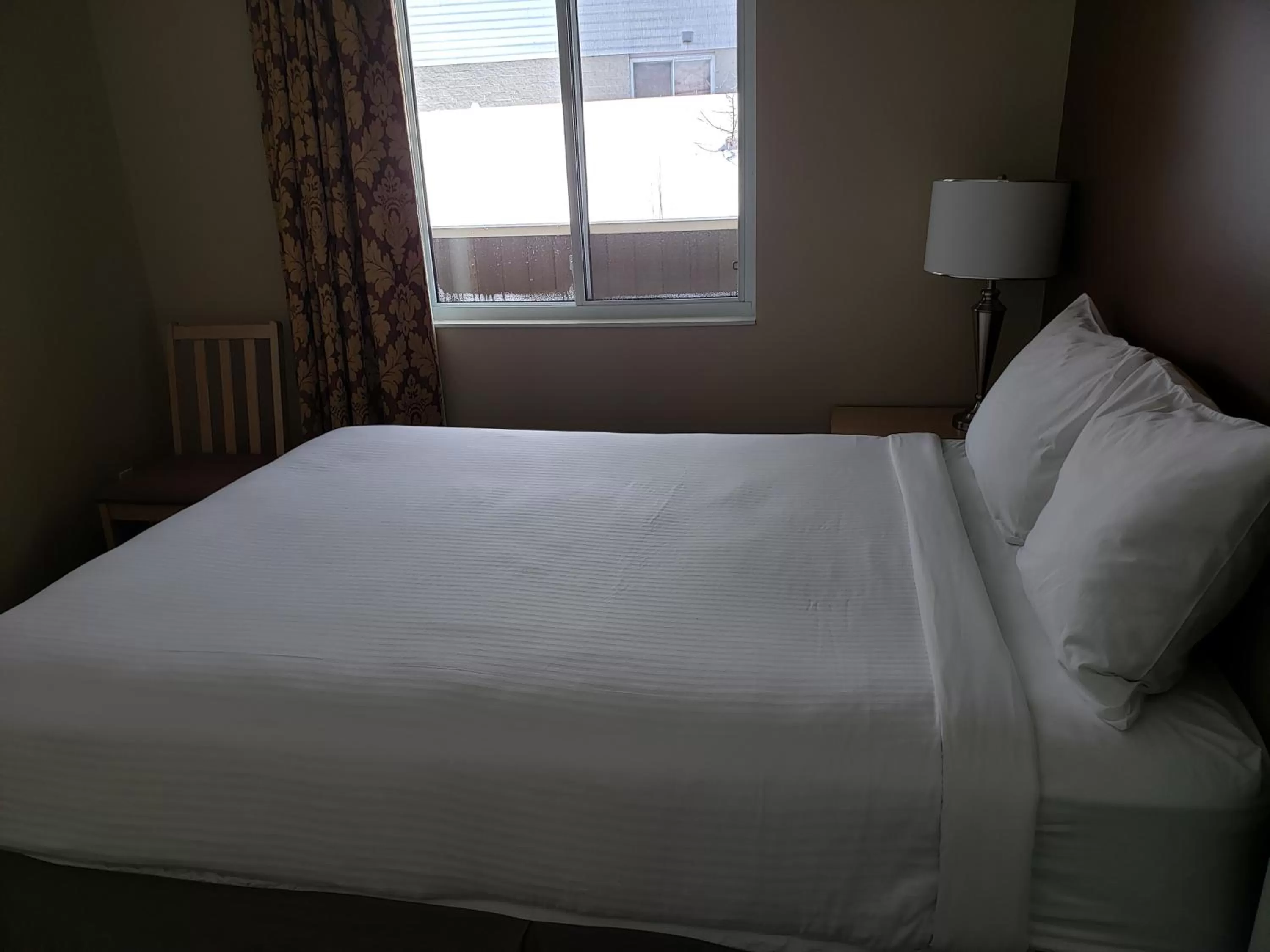 Bed in Shemron Suites Hotel