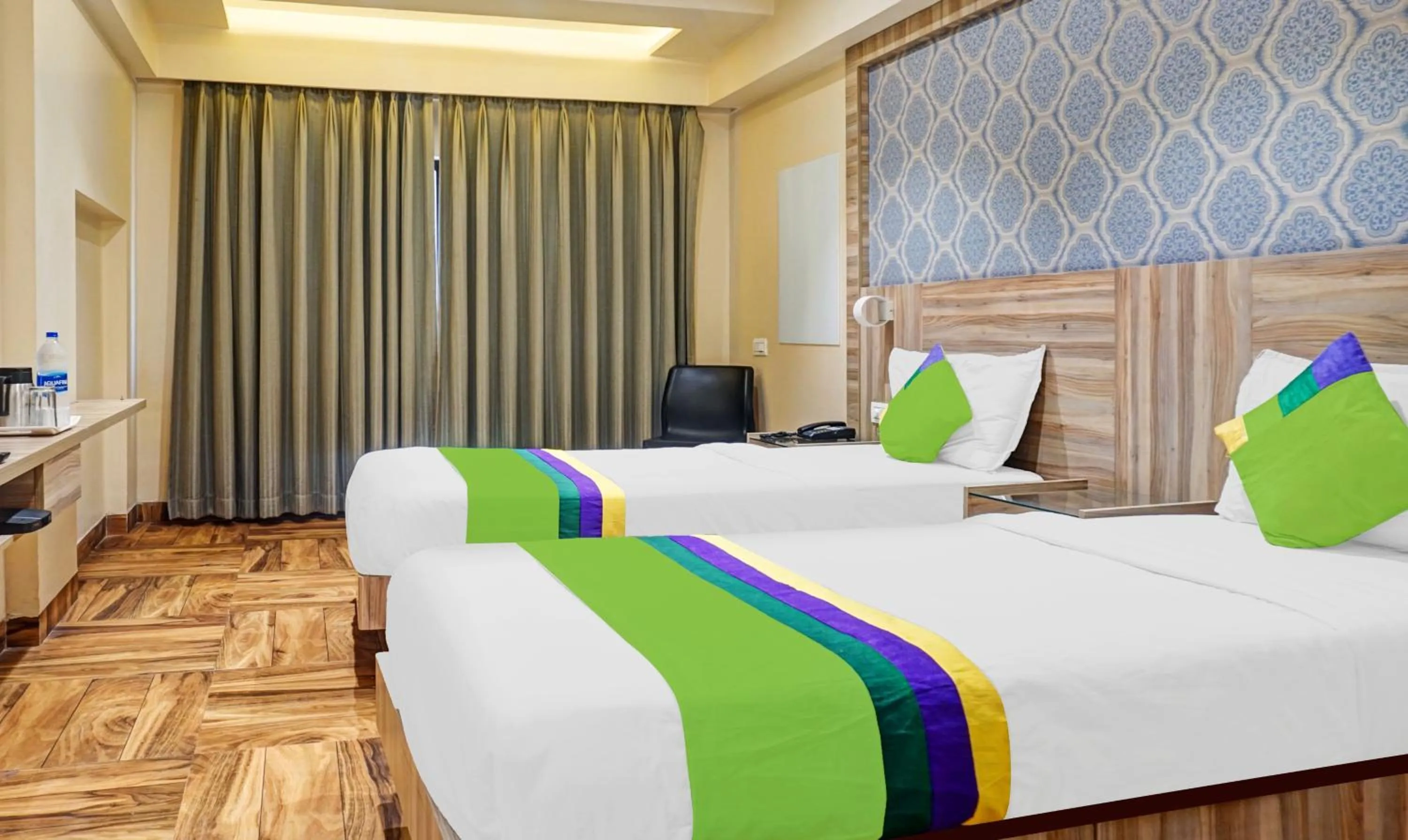 Bedroom, Bed in Treebo Classic Grande, Camp