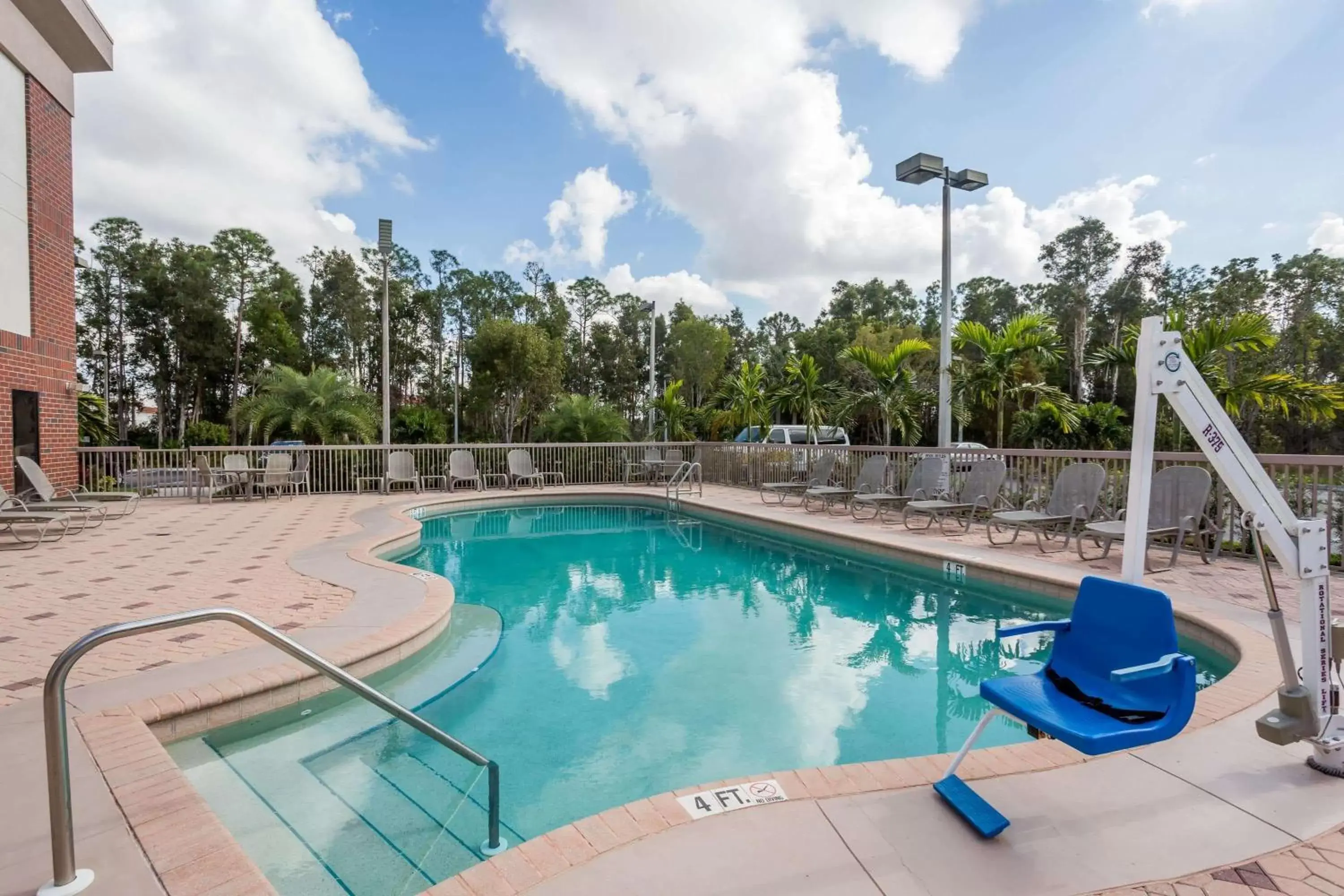 On site, Swimming Pool in Days Inn & Suites by Wyndham Fort Myers Near JetBlue Park