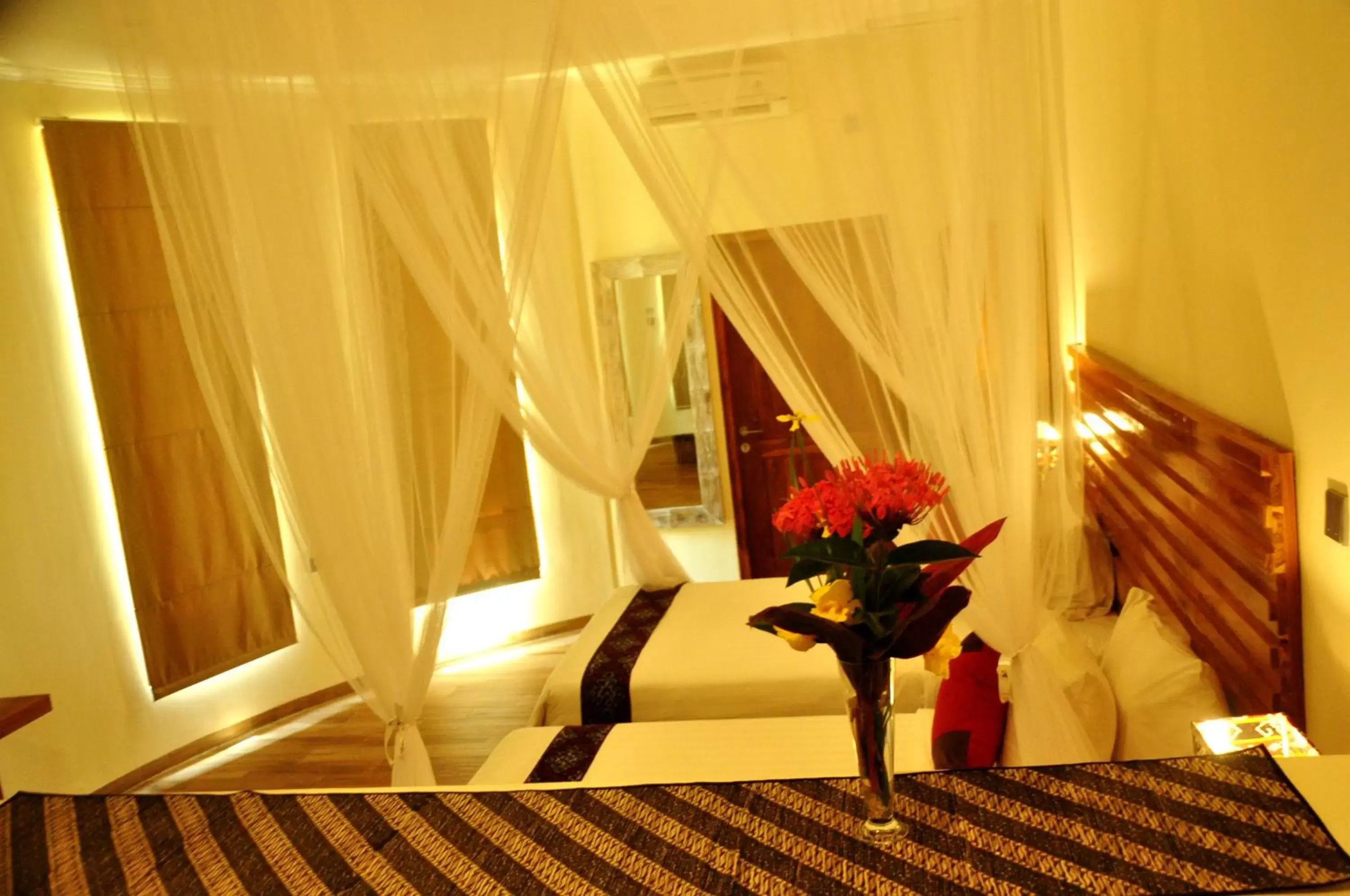 Bedroom, Bed in Puri Sari Beach Hotel