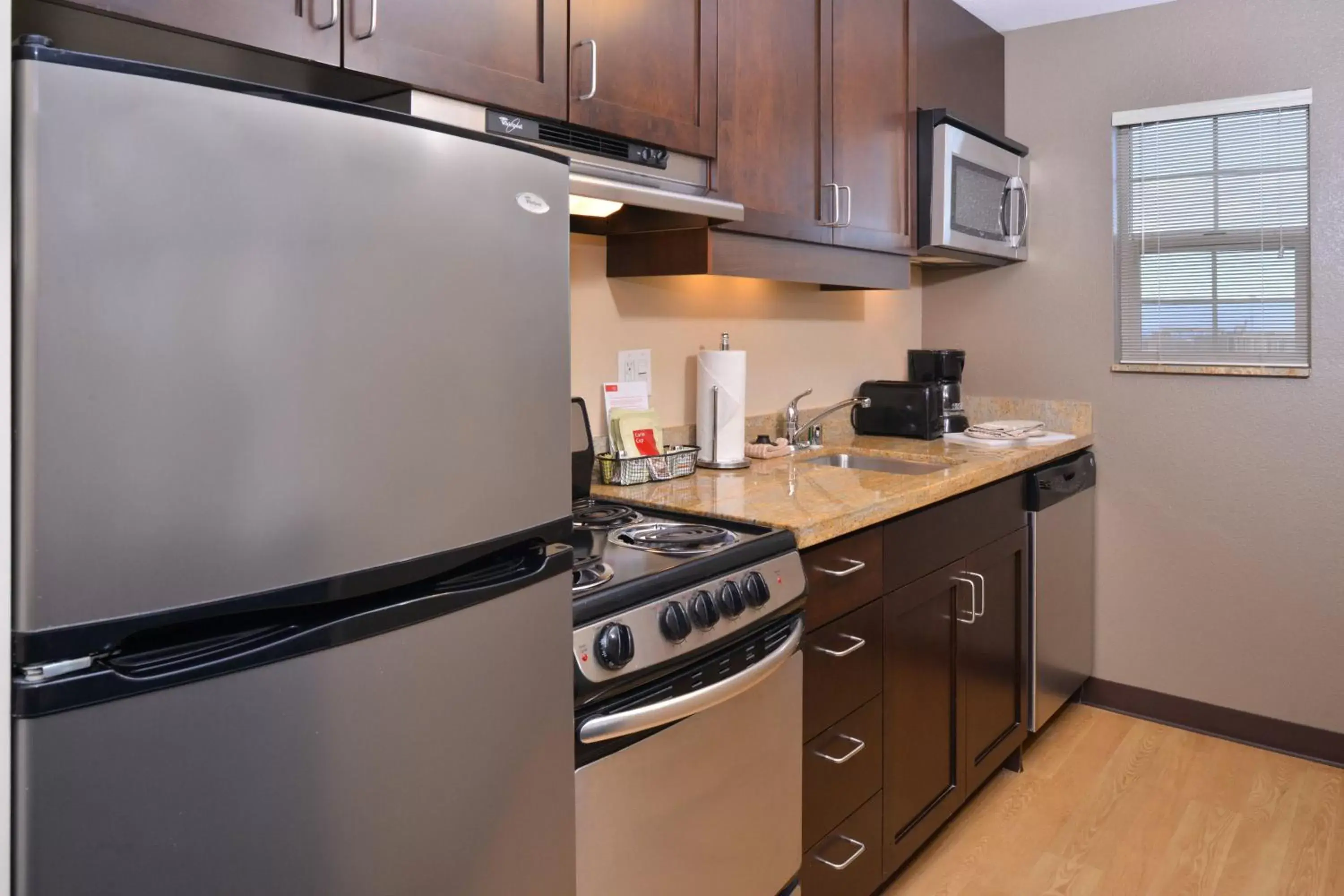 Bedroom, Kitchen/Kitchenette in TownePlace Suites by Marriott Las Vegas Henderson