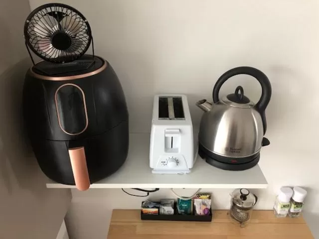 Coffee/tea facilities in Coachman Motel