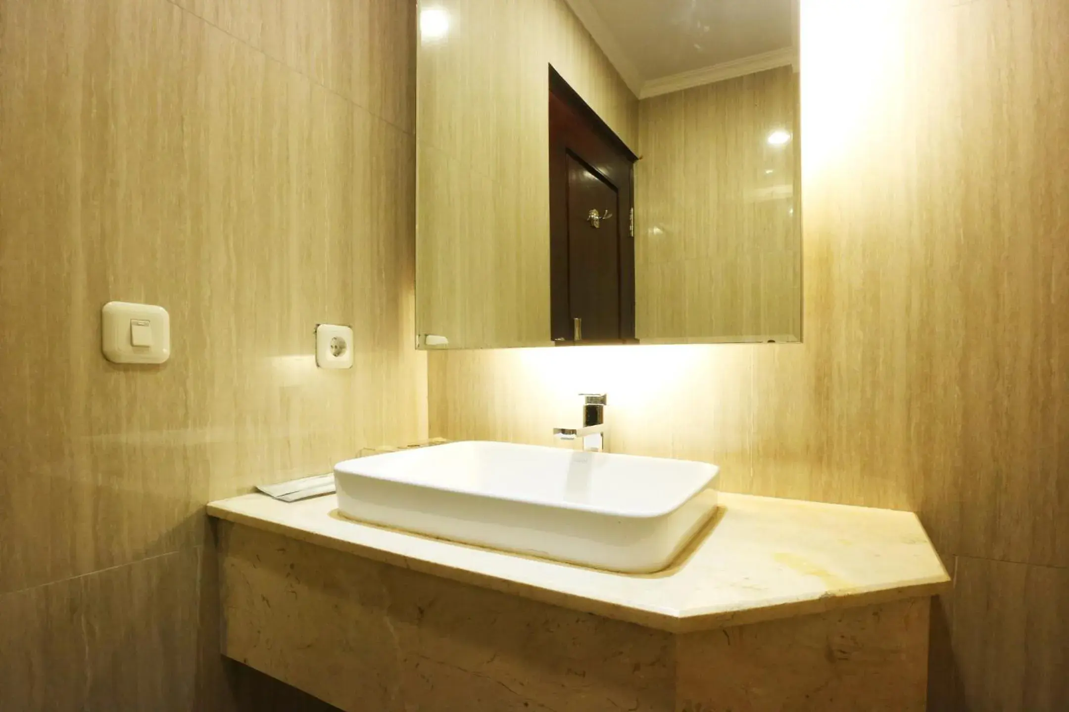 Bathroom in Coins Hotel Jakarta