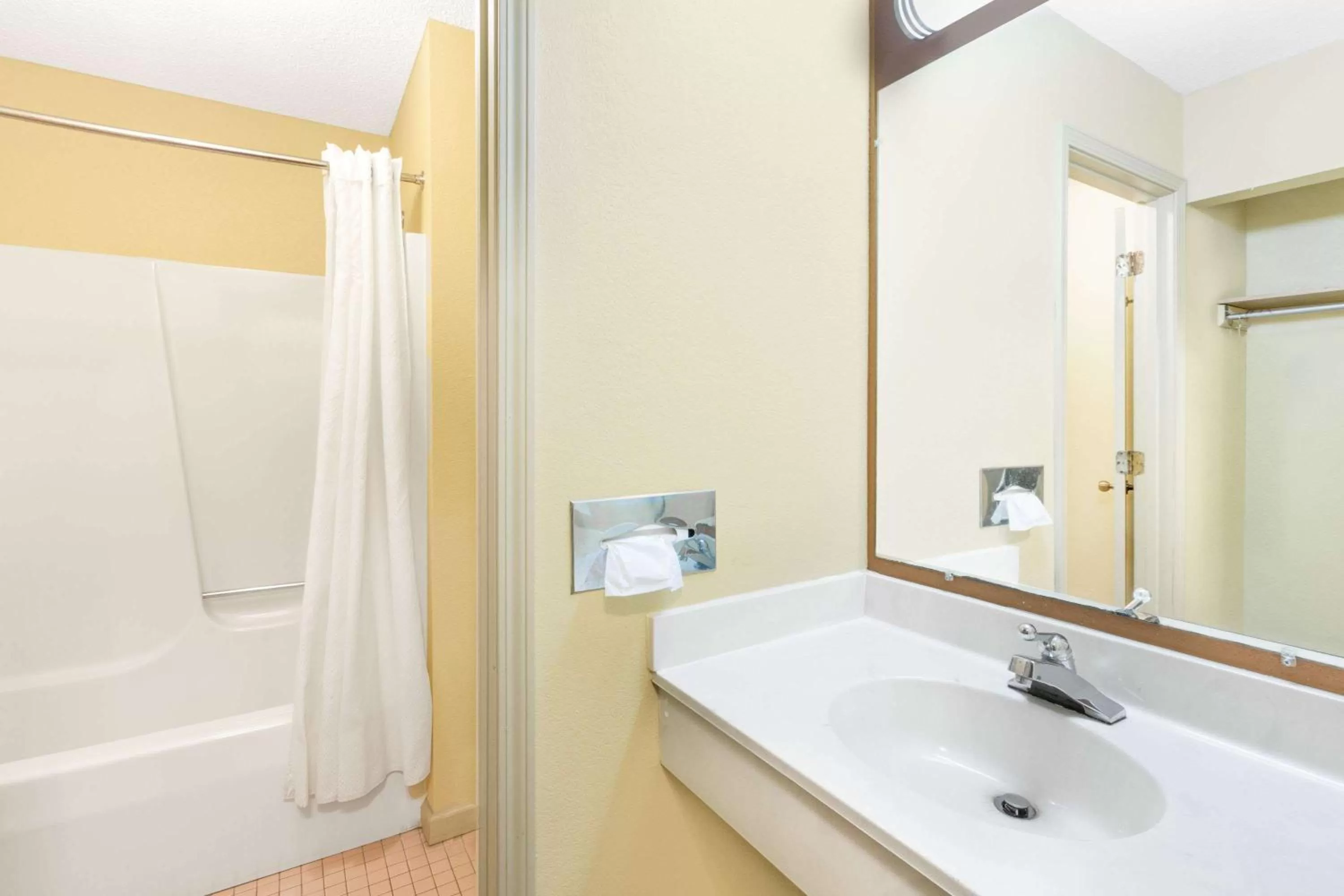 Bathroom in Days Inn & Suites by Wyndham Kalamazoo