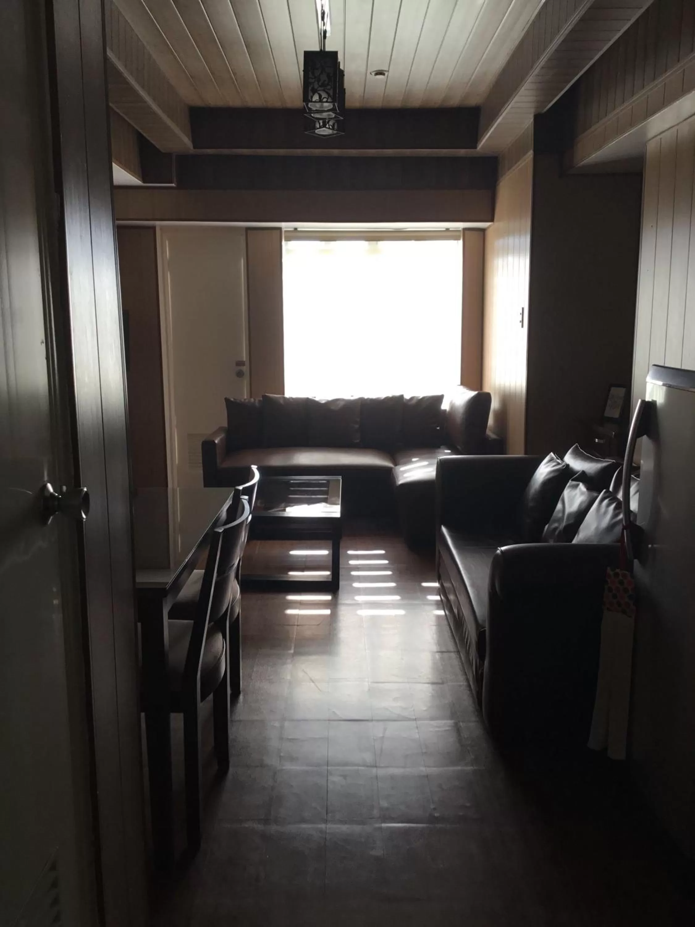 Living room in Condo with Free Swimming Pool & Viewing Deck