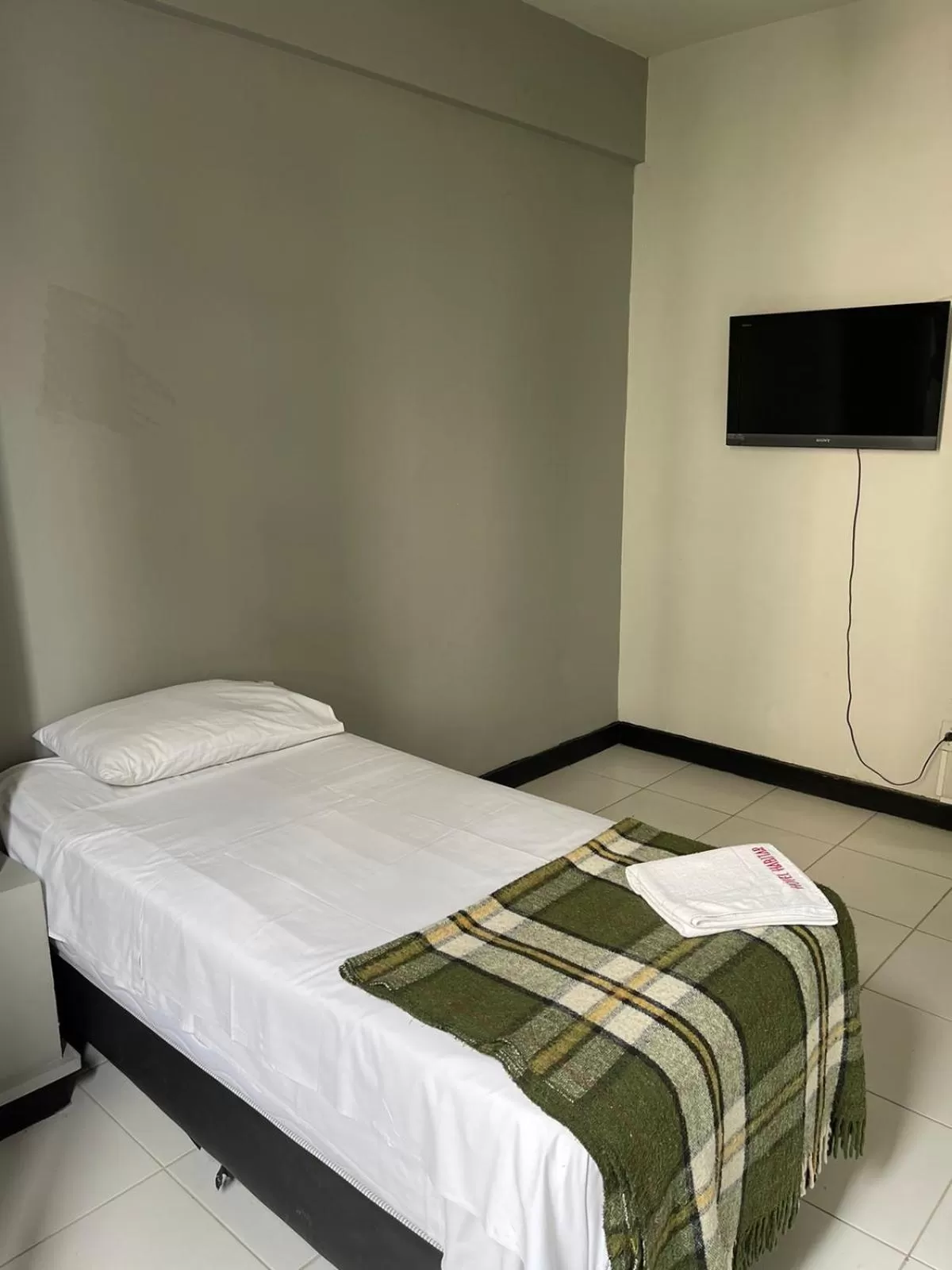 Bedroom, Bed in Hotel Economy 888 - Próximo a Praça da Estação e Rodoviária