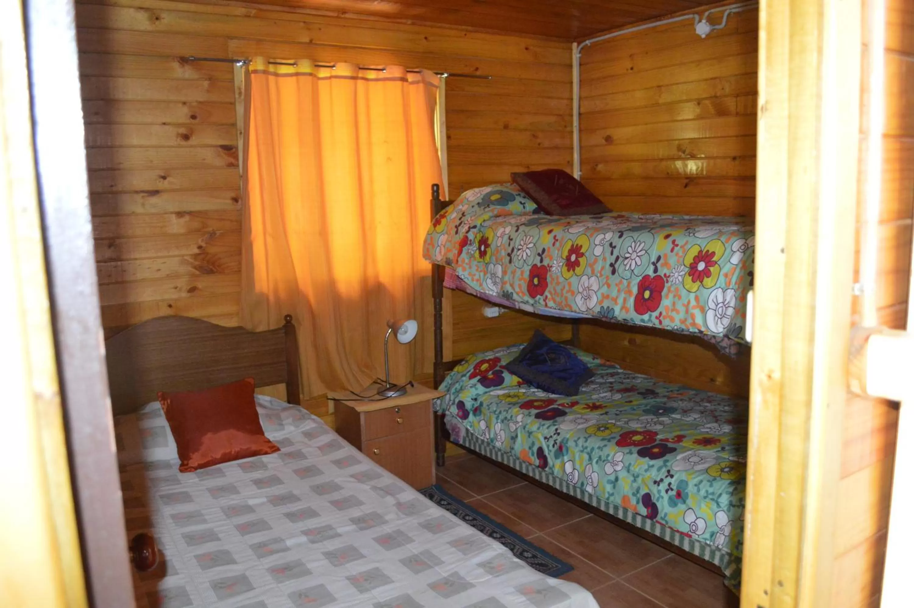 Bed in Coyunche Cabañas y Camping Laja & San Rosendo