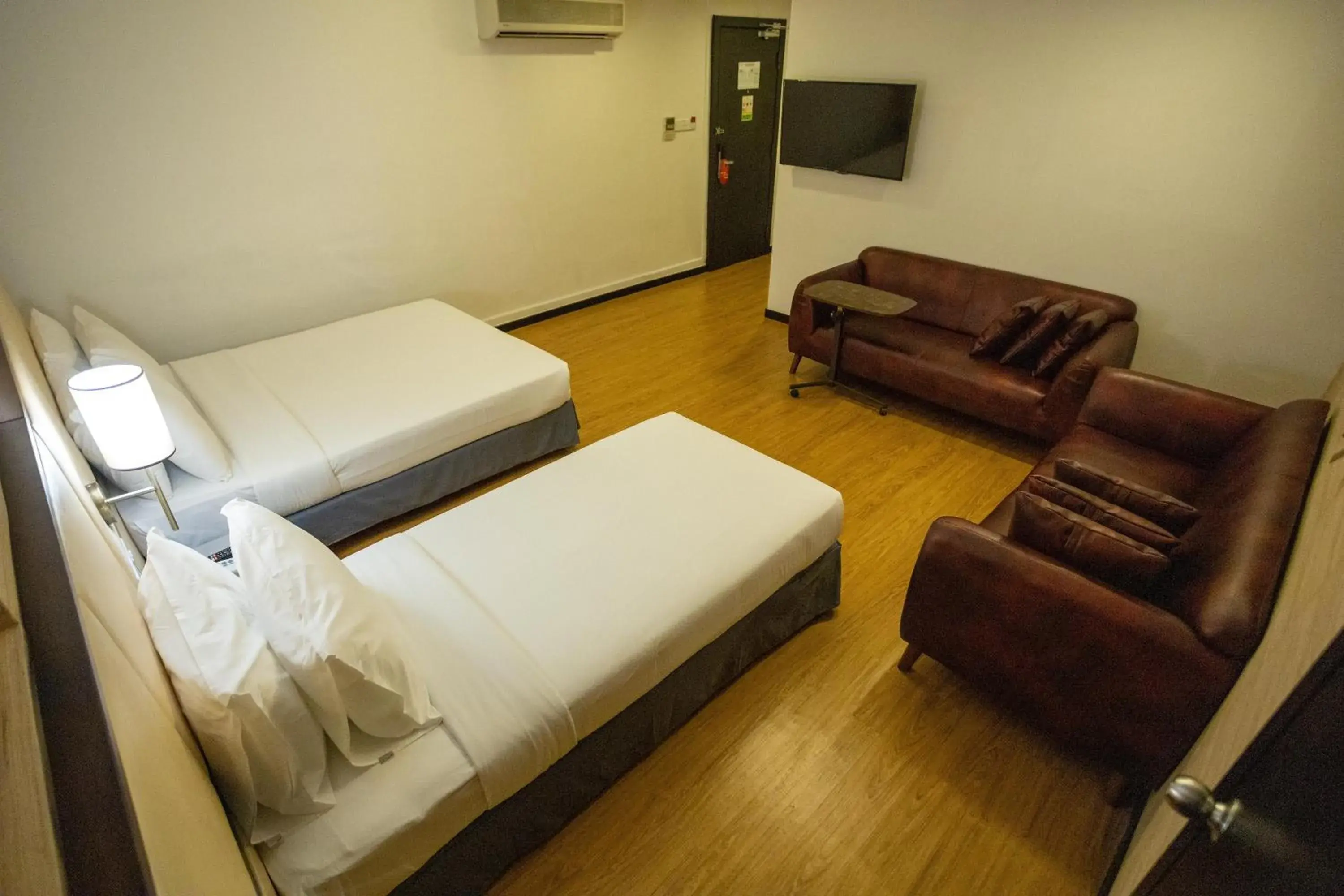 Bedroom, Seating Area in Citrus Hotel Johor Bahru by Compass Hospitality