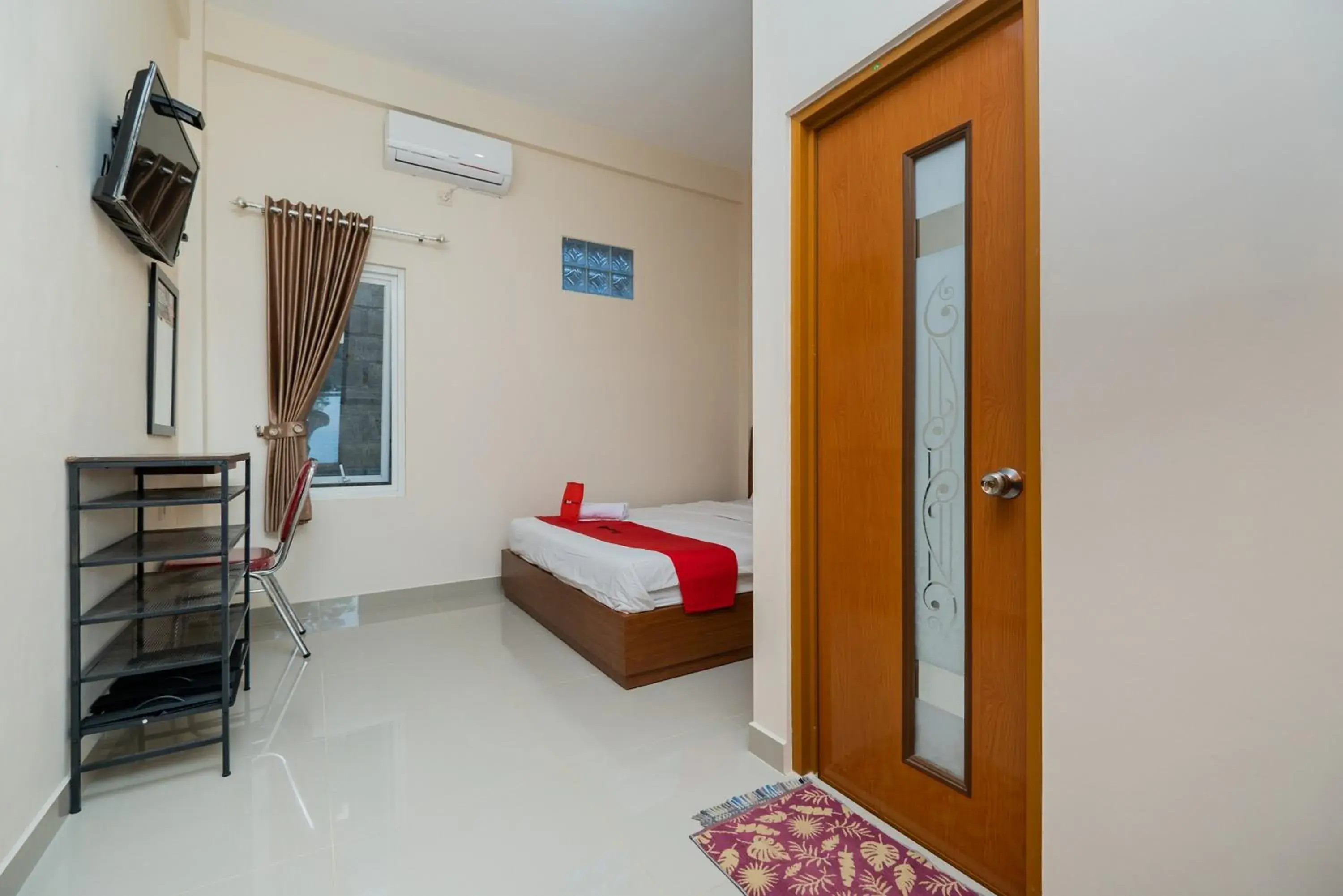 Bed in RedDoorz Syariah near Batu Night Spectacular