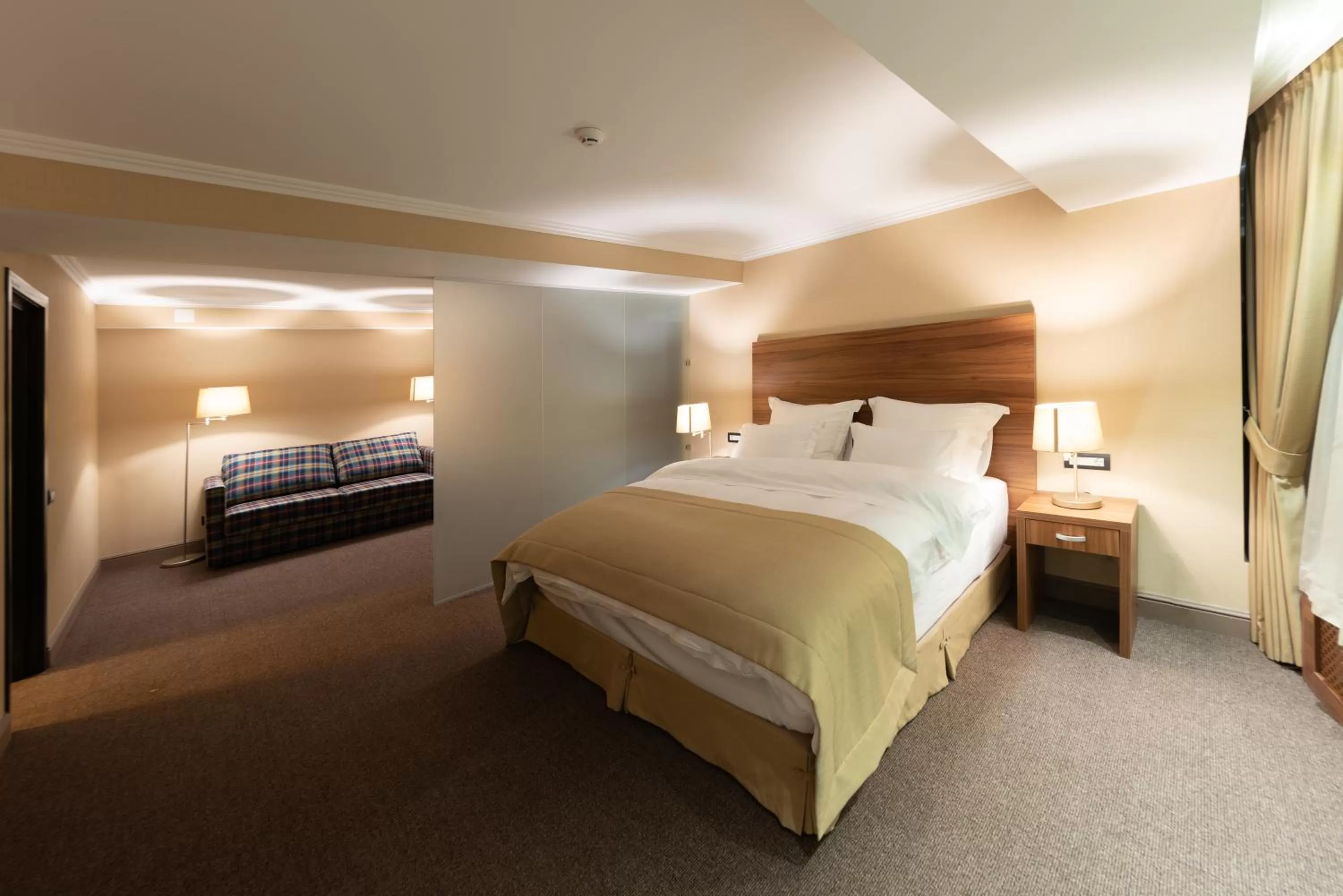 Photo of the whole room, Bed in Daria Suite