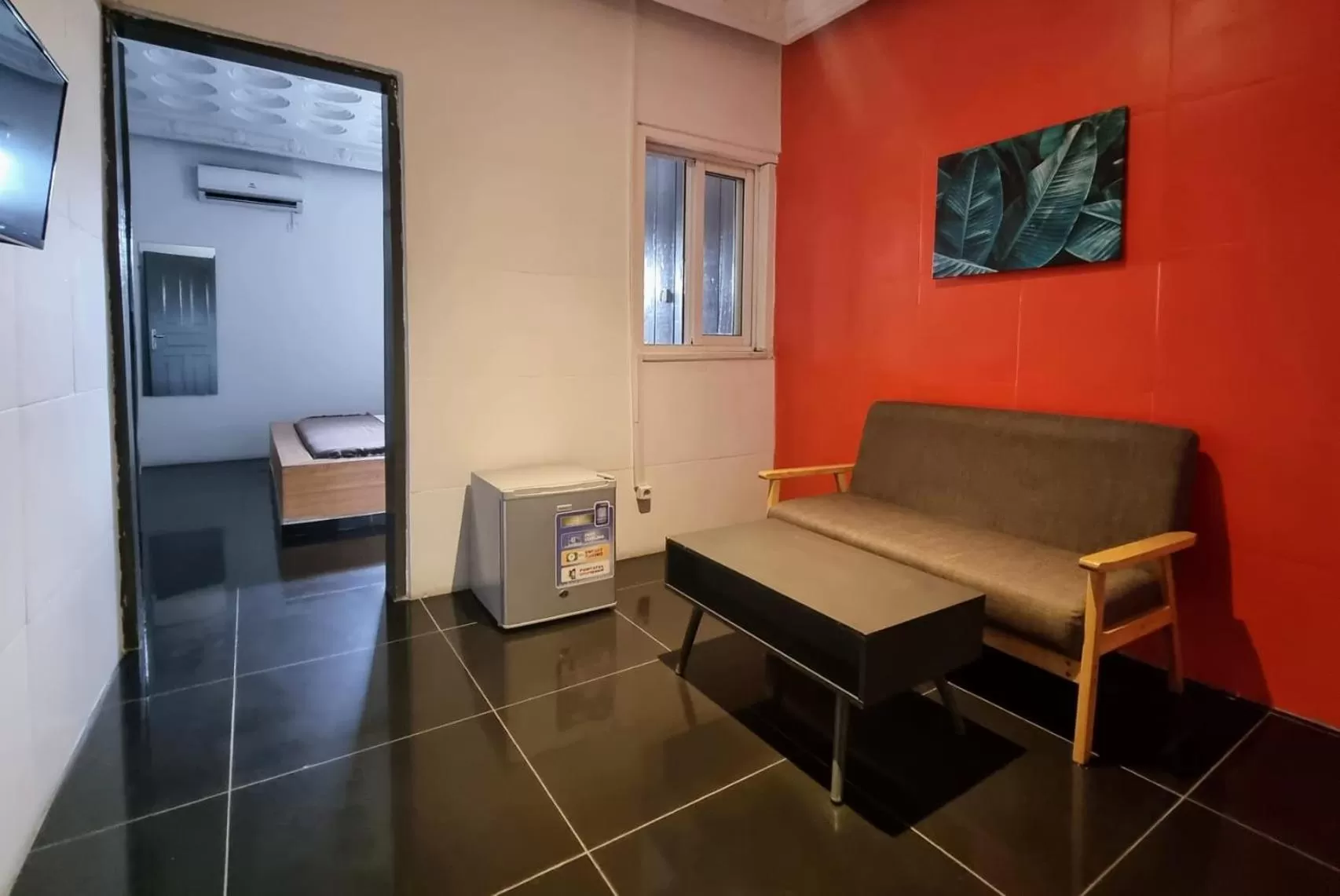 Communal lounge/ TV room, Seating Area in La Maison de Kouadio