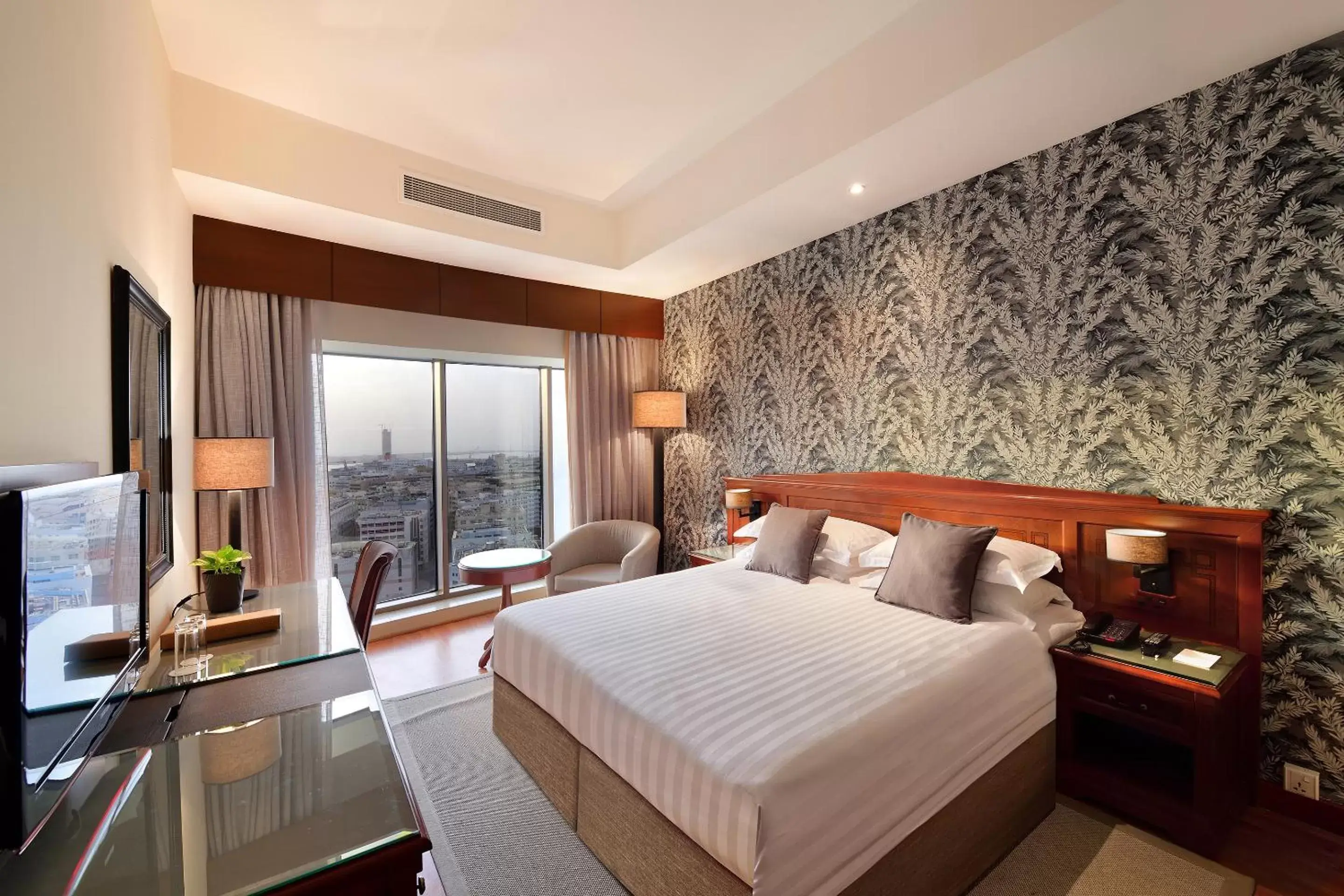 Bedroom in Majestic City Retreat Hotel