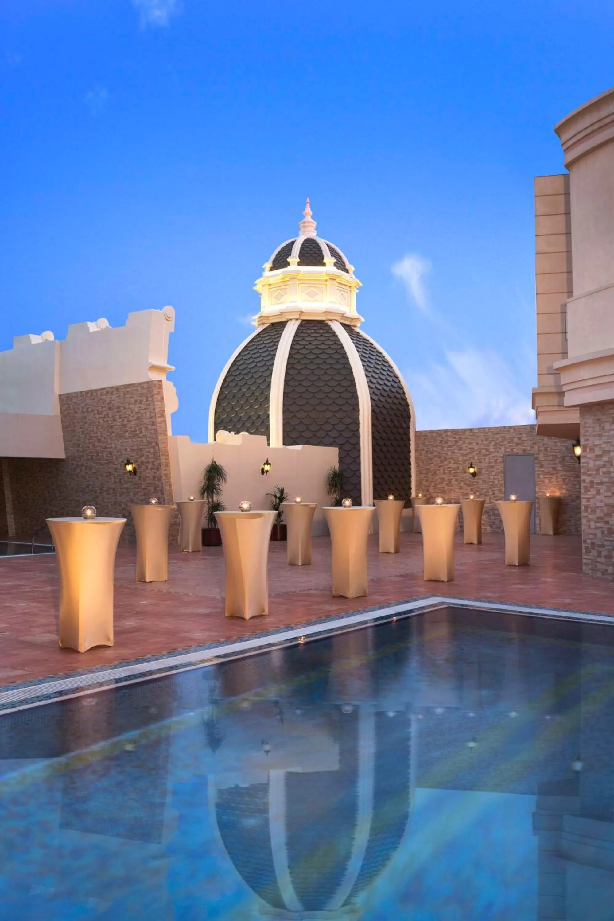 Pool view in Royal Rose Abu Dhabi, a Curio Collection by Hilton Affiliated Hotel