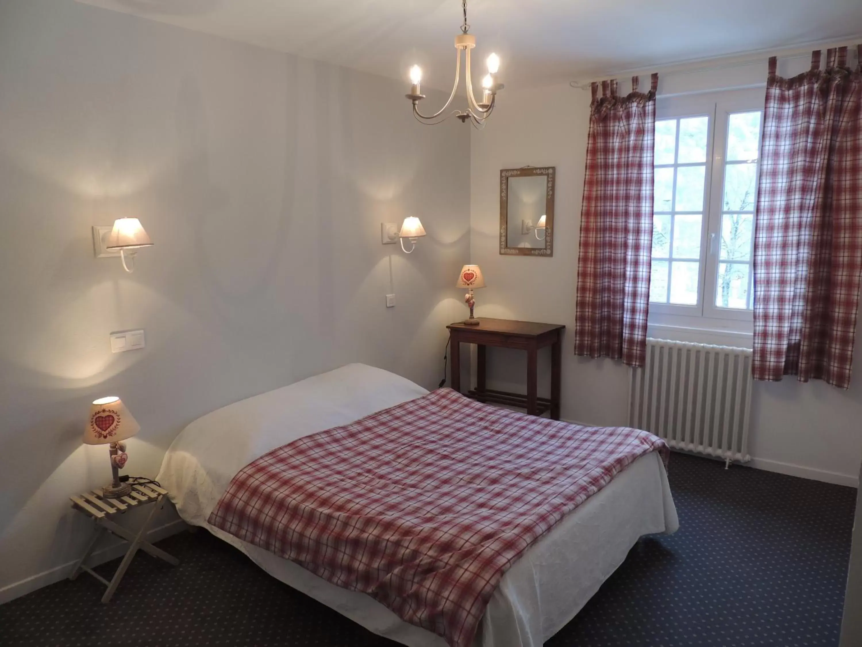 Photo of the whole room, Bed in Hôtel Restaurant du Plomb du Cantal