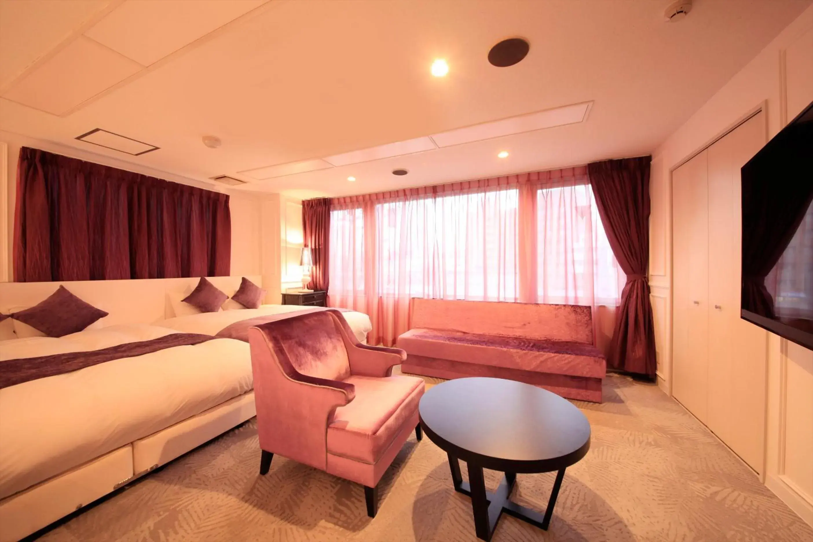 Photo of the whole room, Seating Area in Centurion Hotel Villa Suite Fukui Station