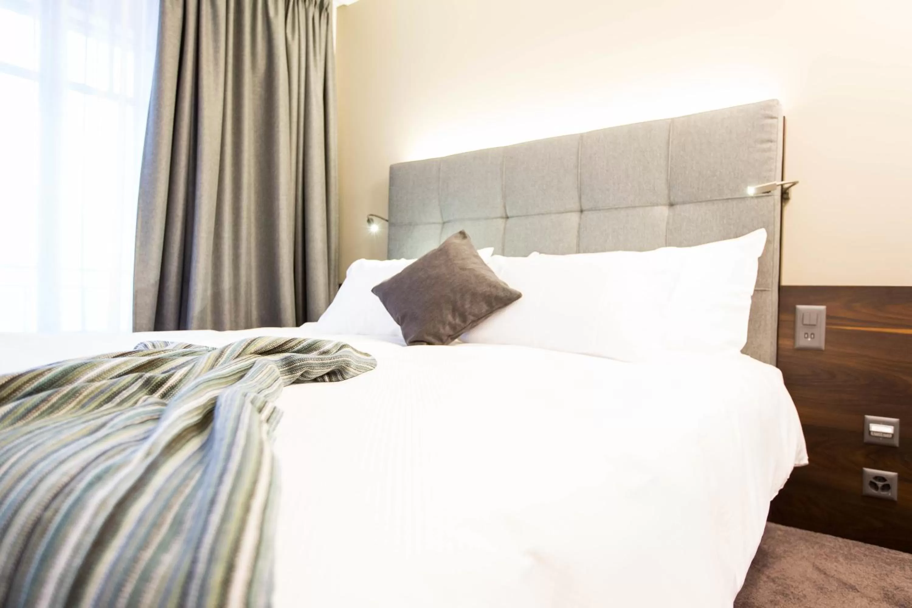 Bed in Hôtel des Voyageurs Boutique