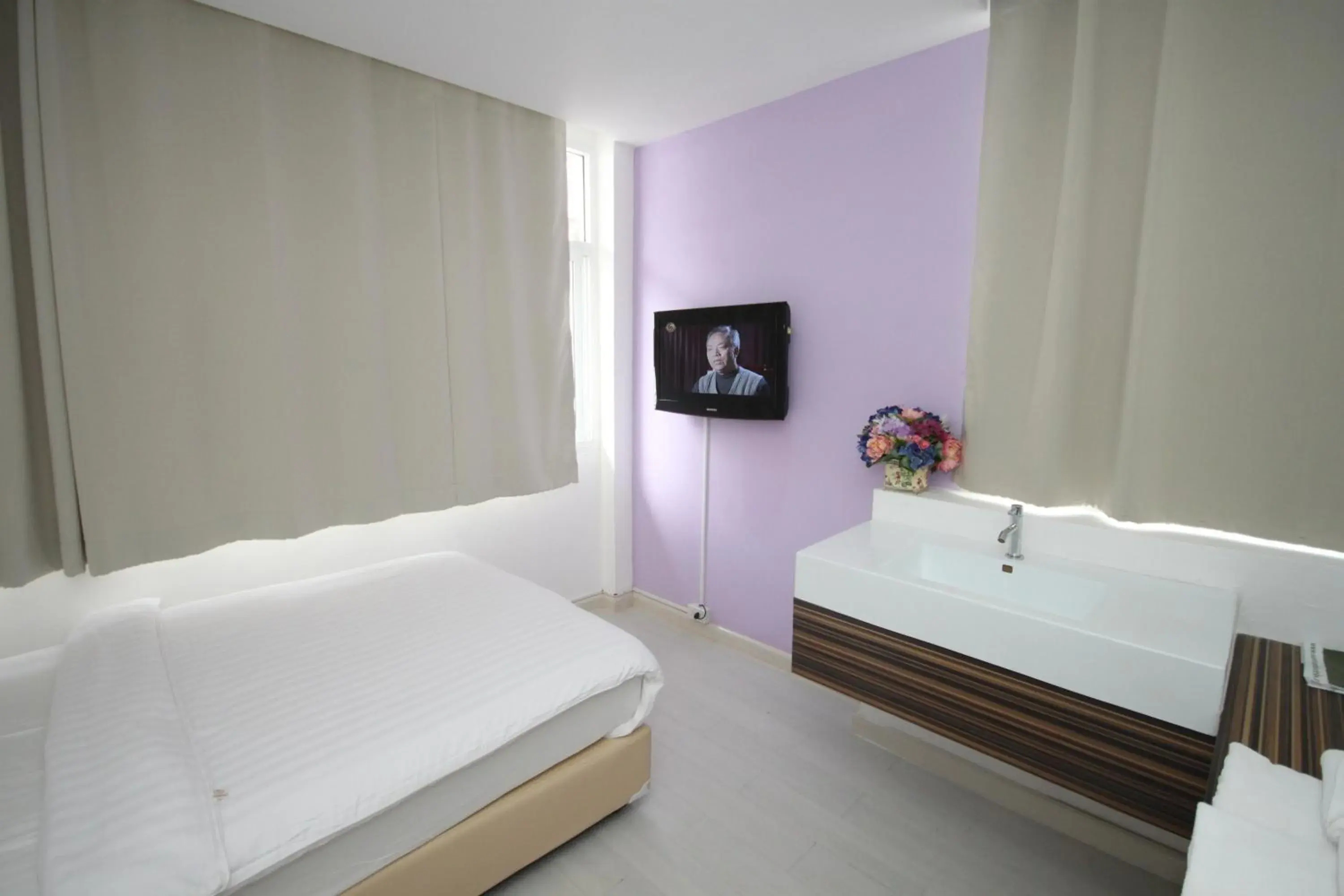 Photo of the whole room, Bed in Nantra Ekamai Hotel