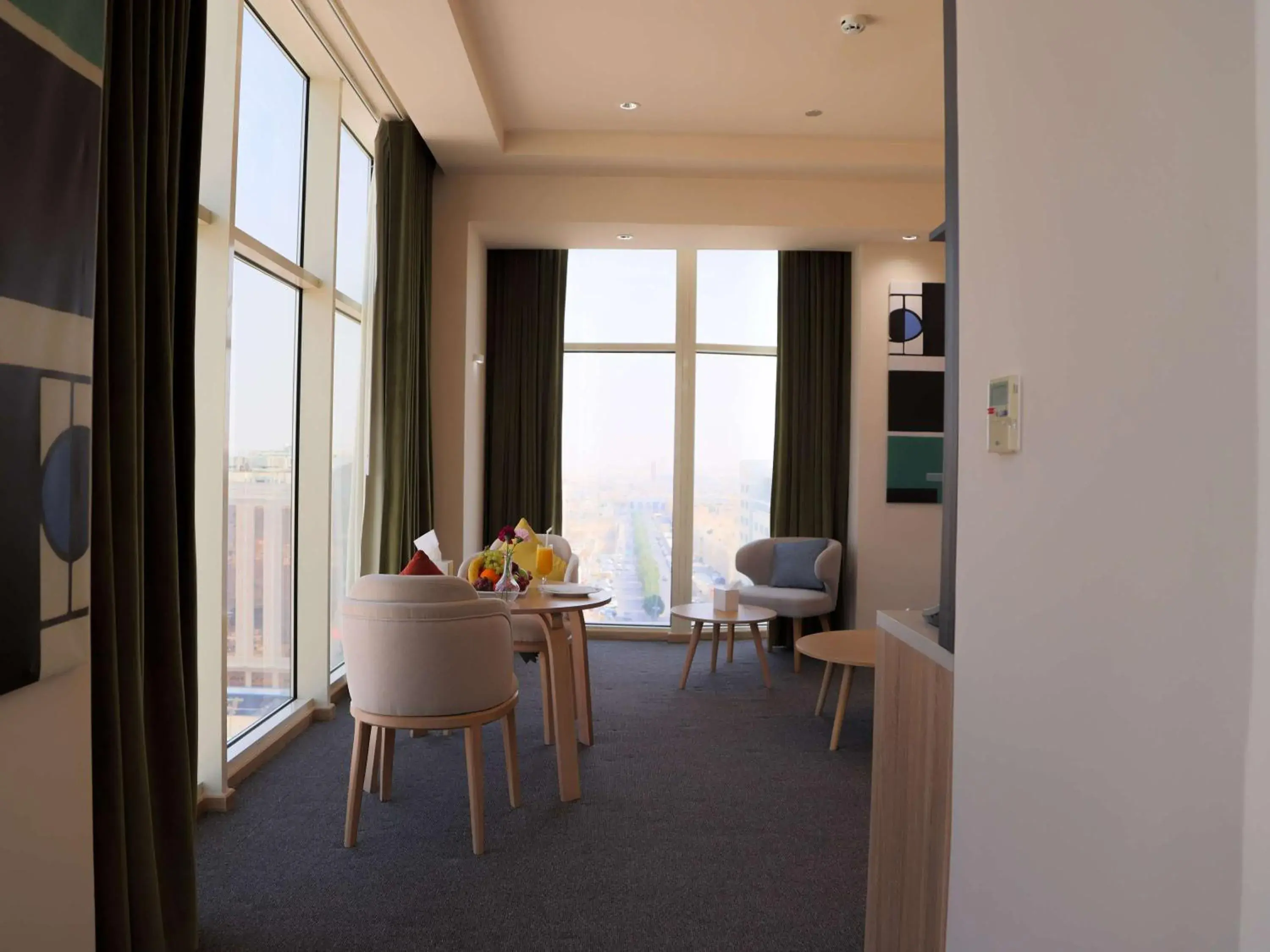 Bedroom, Dining Area in Novotel Suites Riyadh Dyar