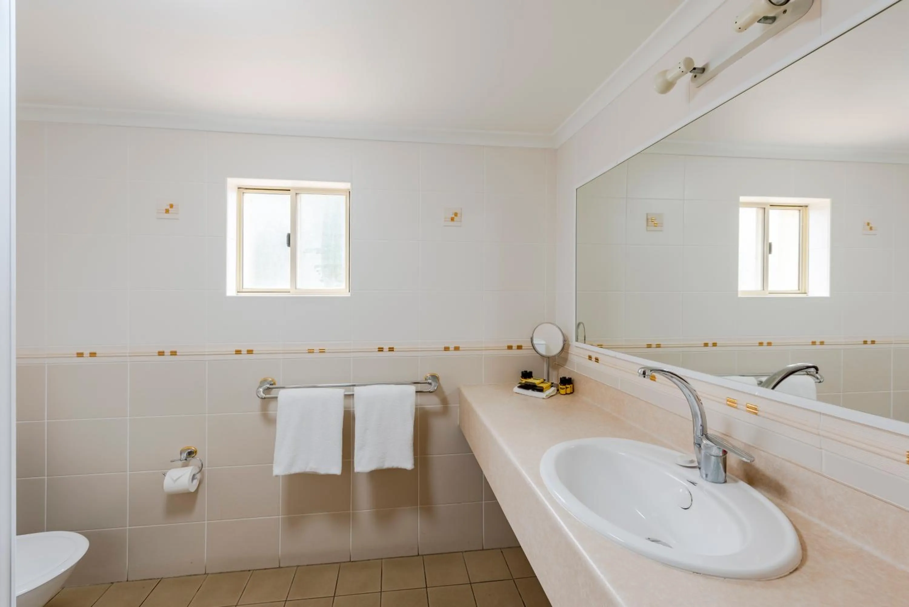 Bathroom in Best Western Plus Ambassador Orange