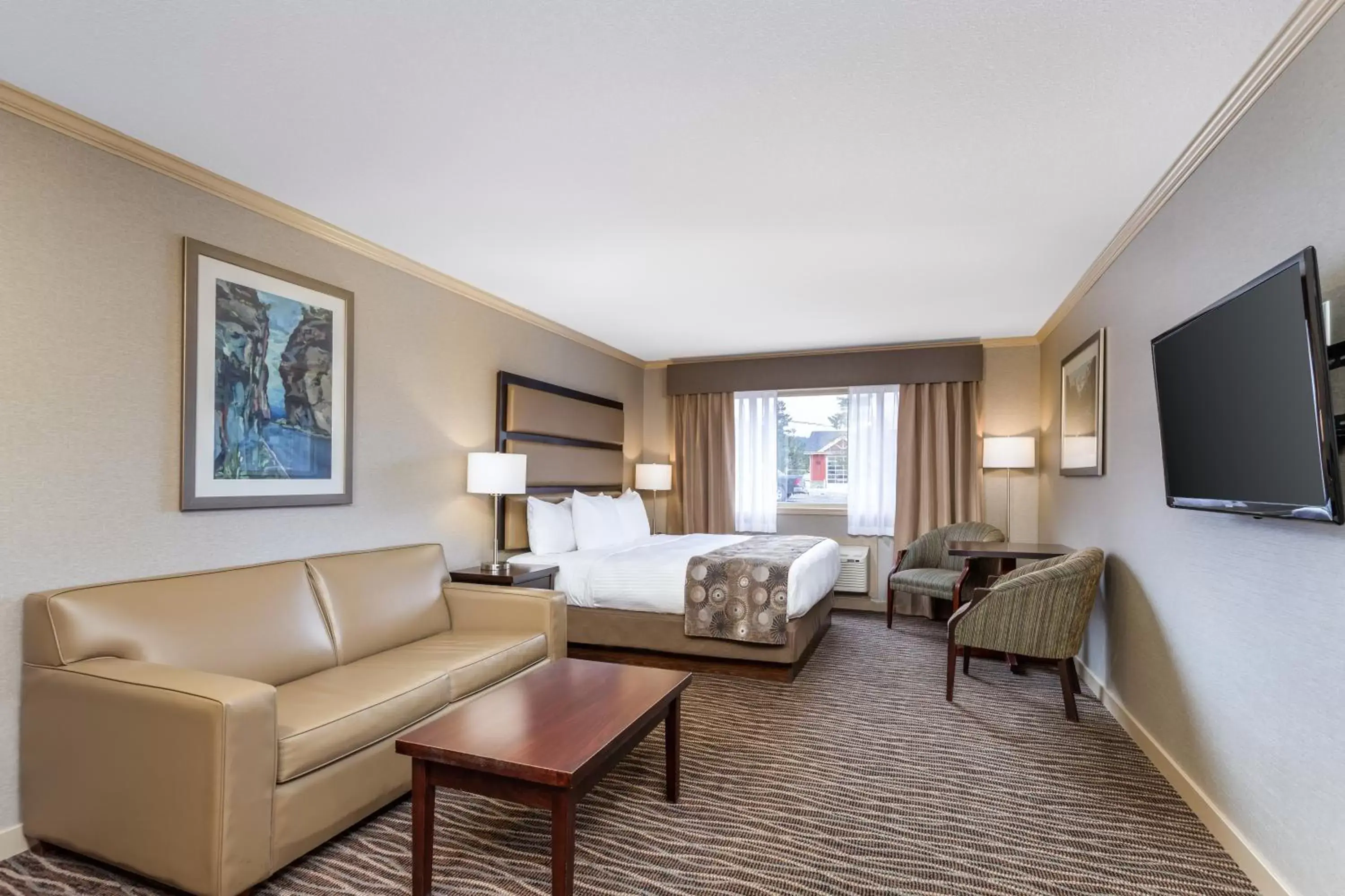 Bed, Seating Area in Prestige Radium Hot Springs Resort, WorldHotels Crafted