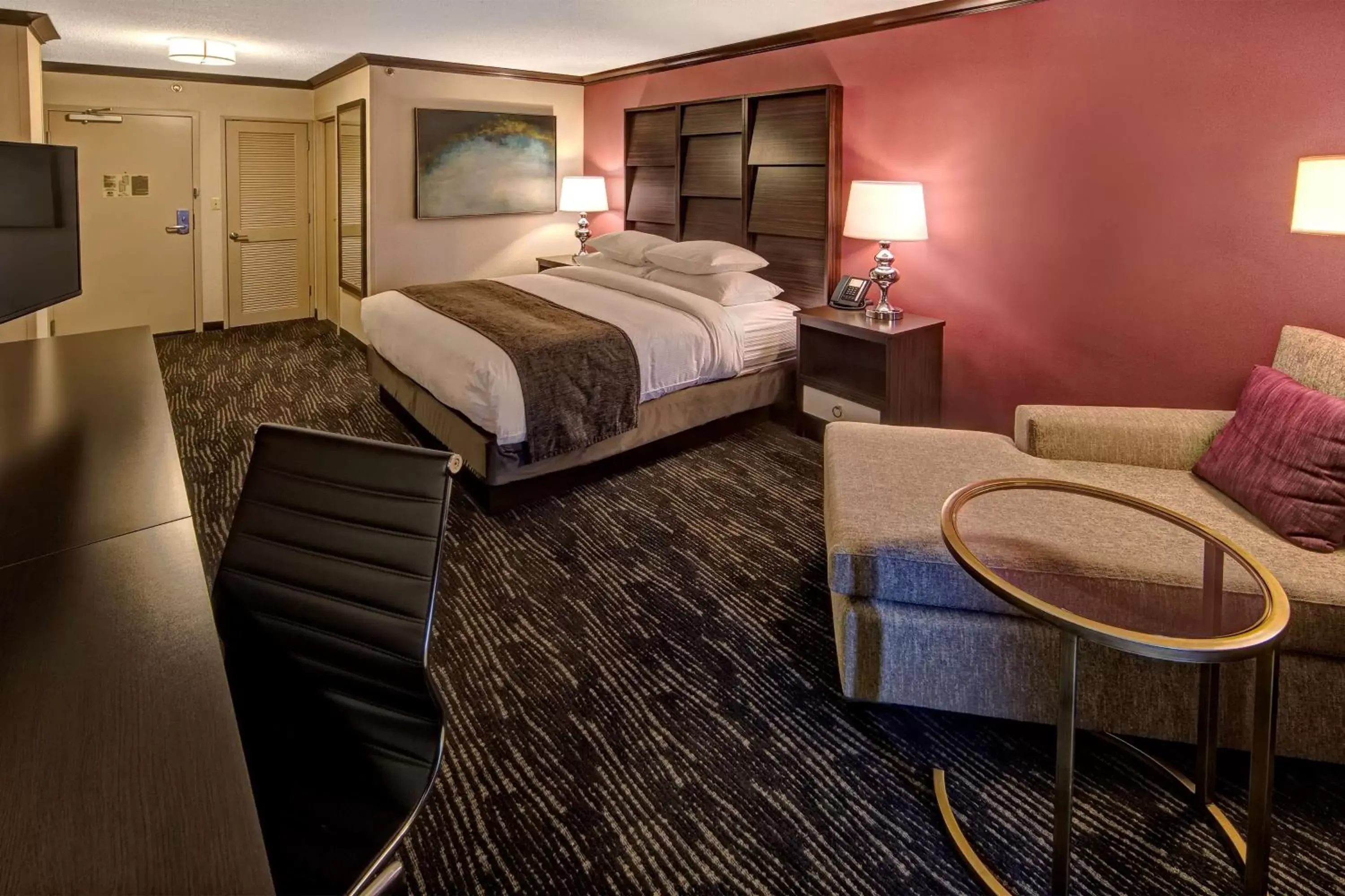 Bed in DoubleTree by Hilton Decatur Riverfront