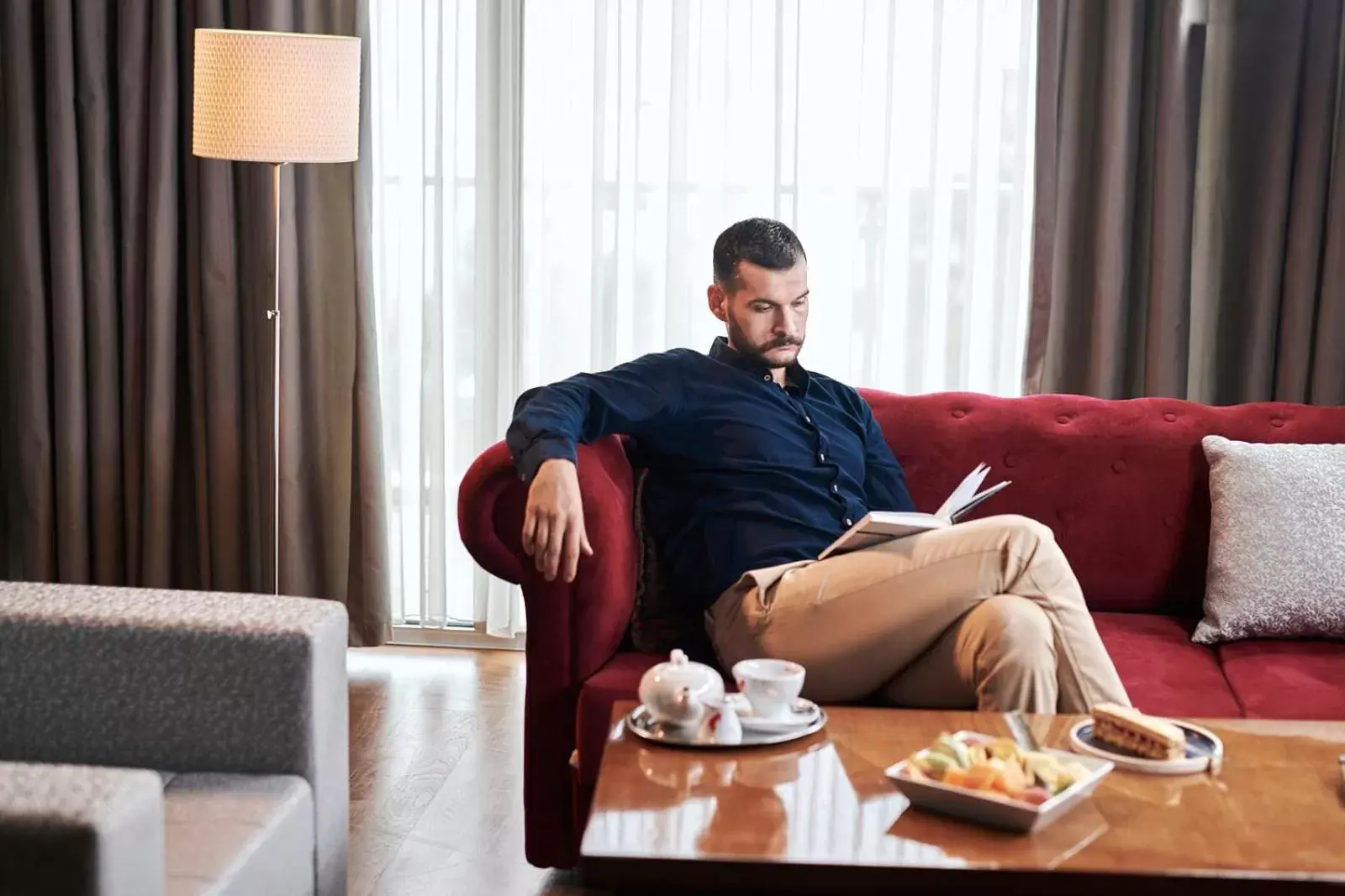 Living room in Ramada by Wyndham Podgorica Living room in Ramada by Wyndham Podgorica