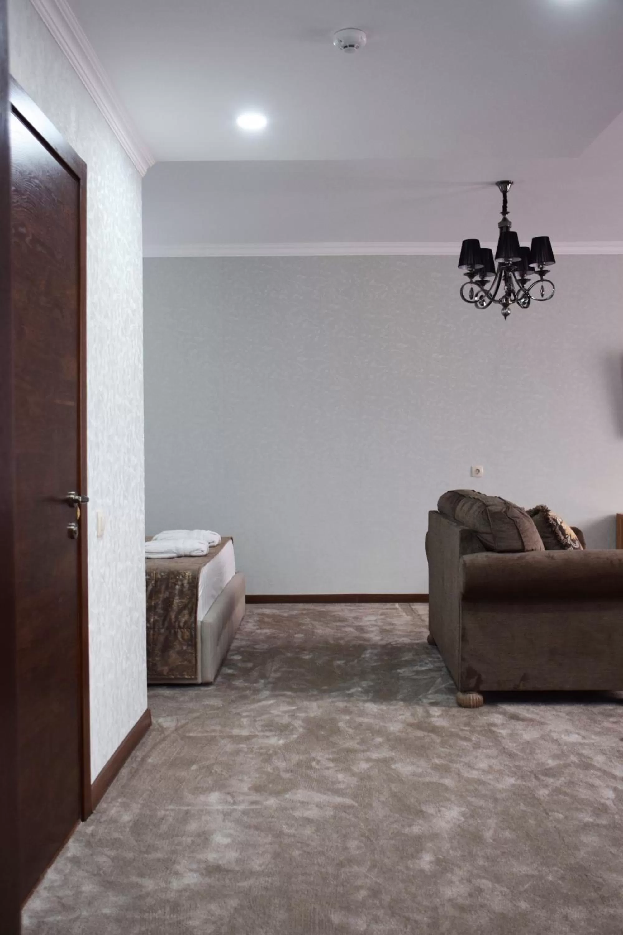 Bedroom in MirOtel Hotel