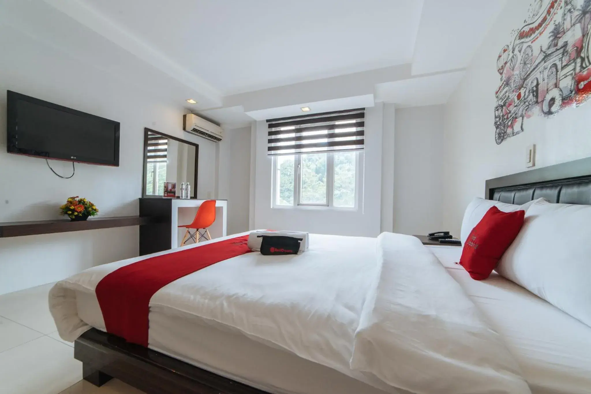 TV and multimedia, Bed in RedDoorz Plus at One Liberty Hotel Kalayaan Avenue