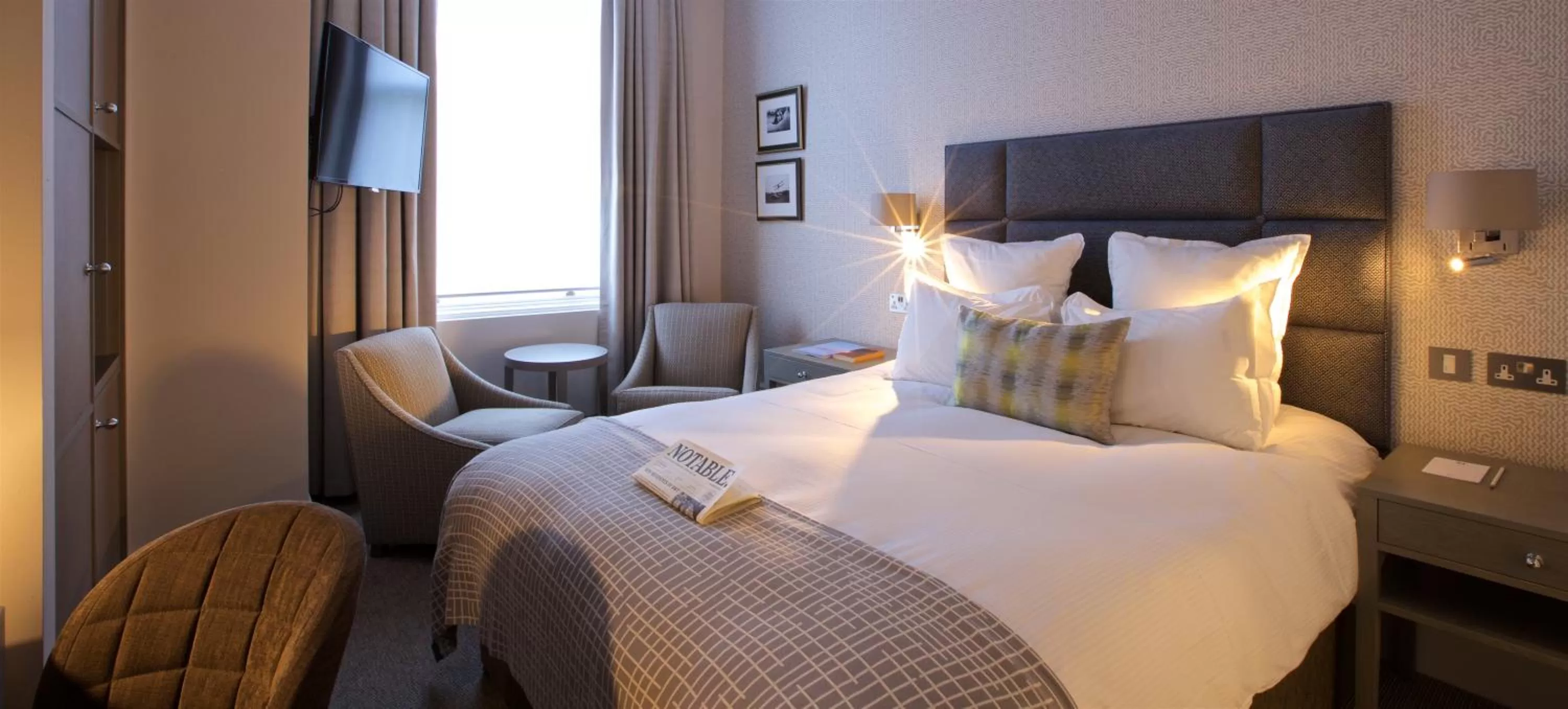 Bed in 54 Queen's Gate Hotel