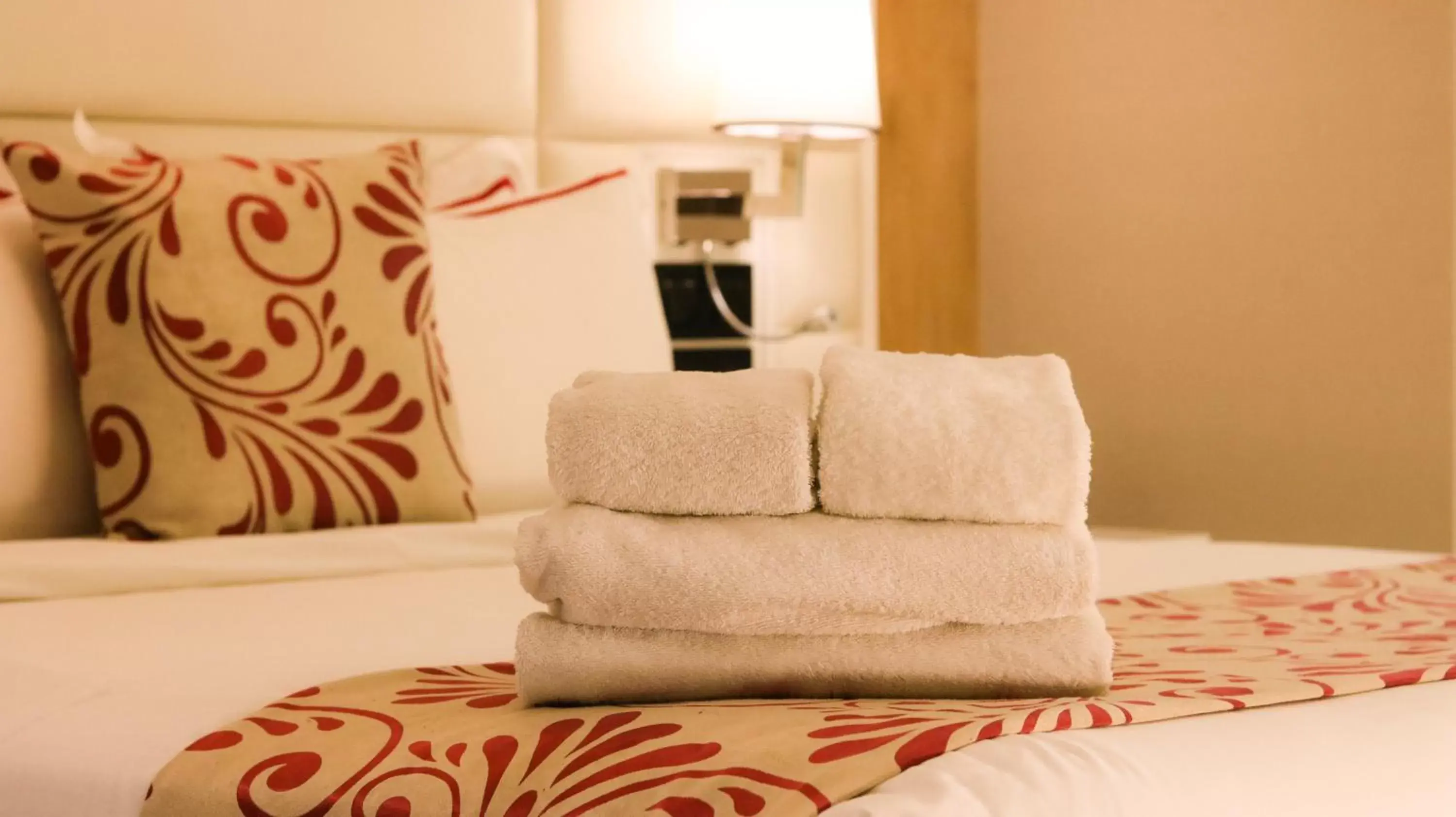 towels, Bed in Red Hotel Cubao, Quezon City