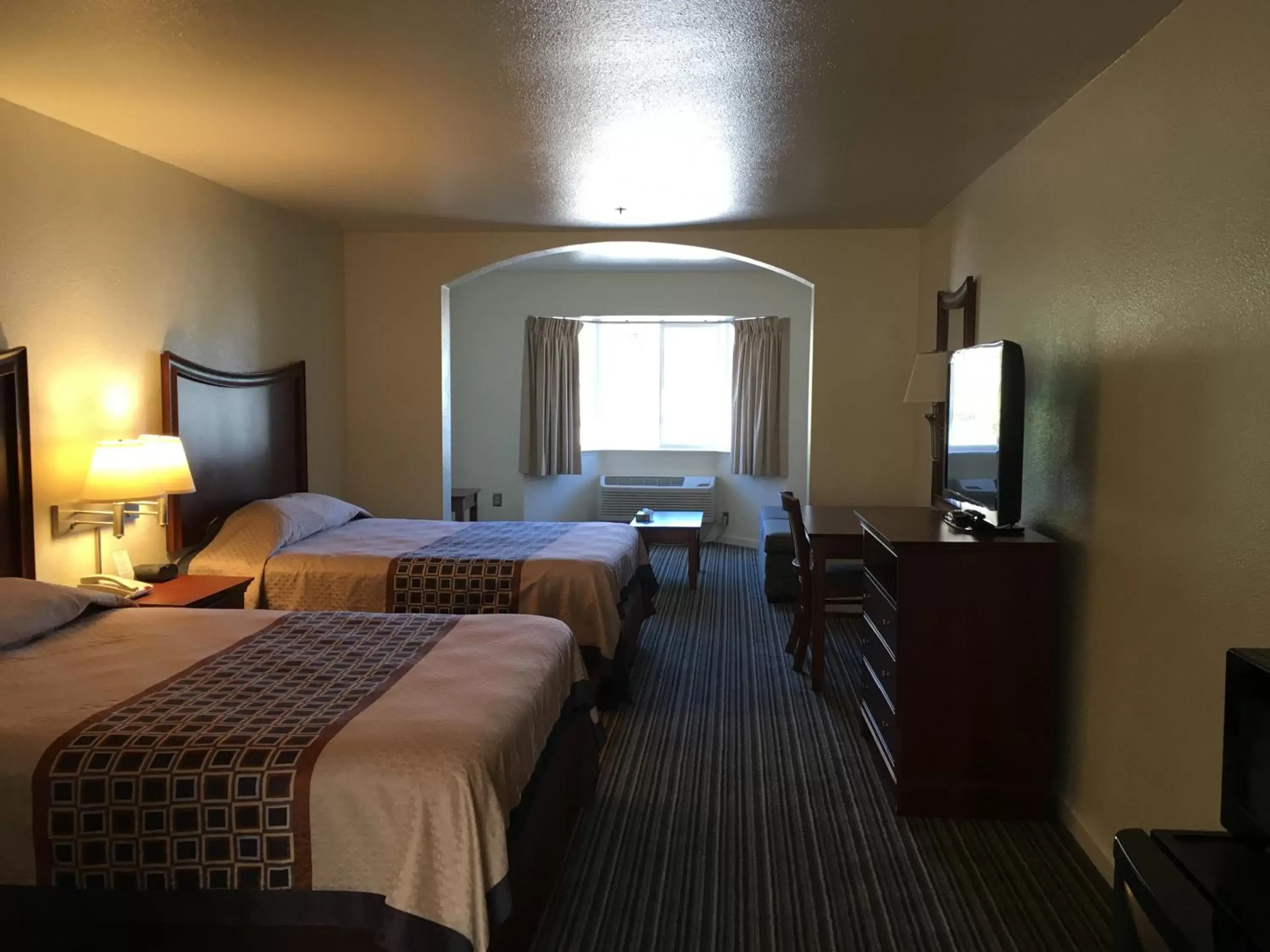 Photo of the whole room in Airport Inn