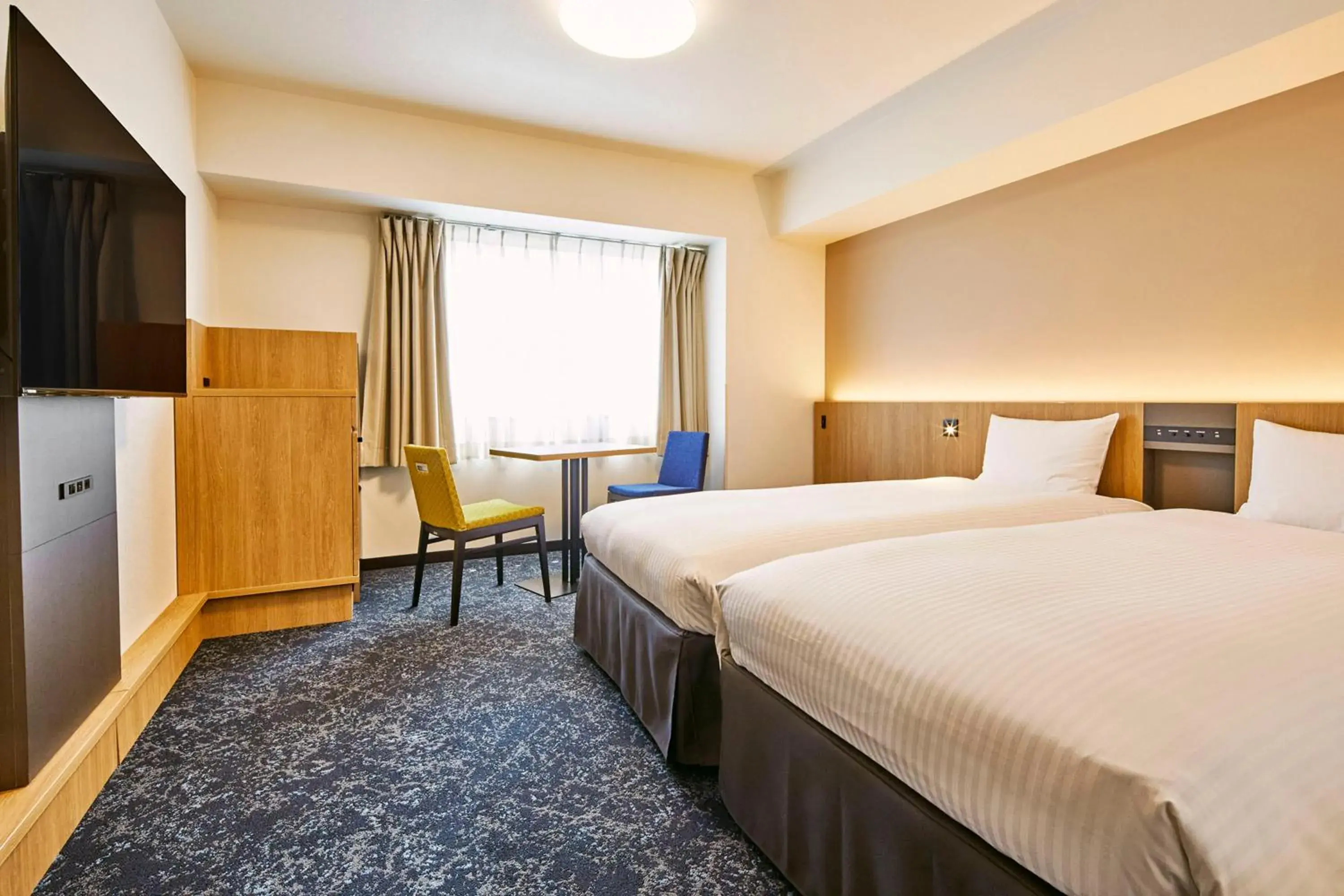 Bed in Hotel Lumiere Kasai Bed in Hotel Lumiere Kasai