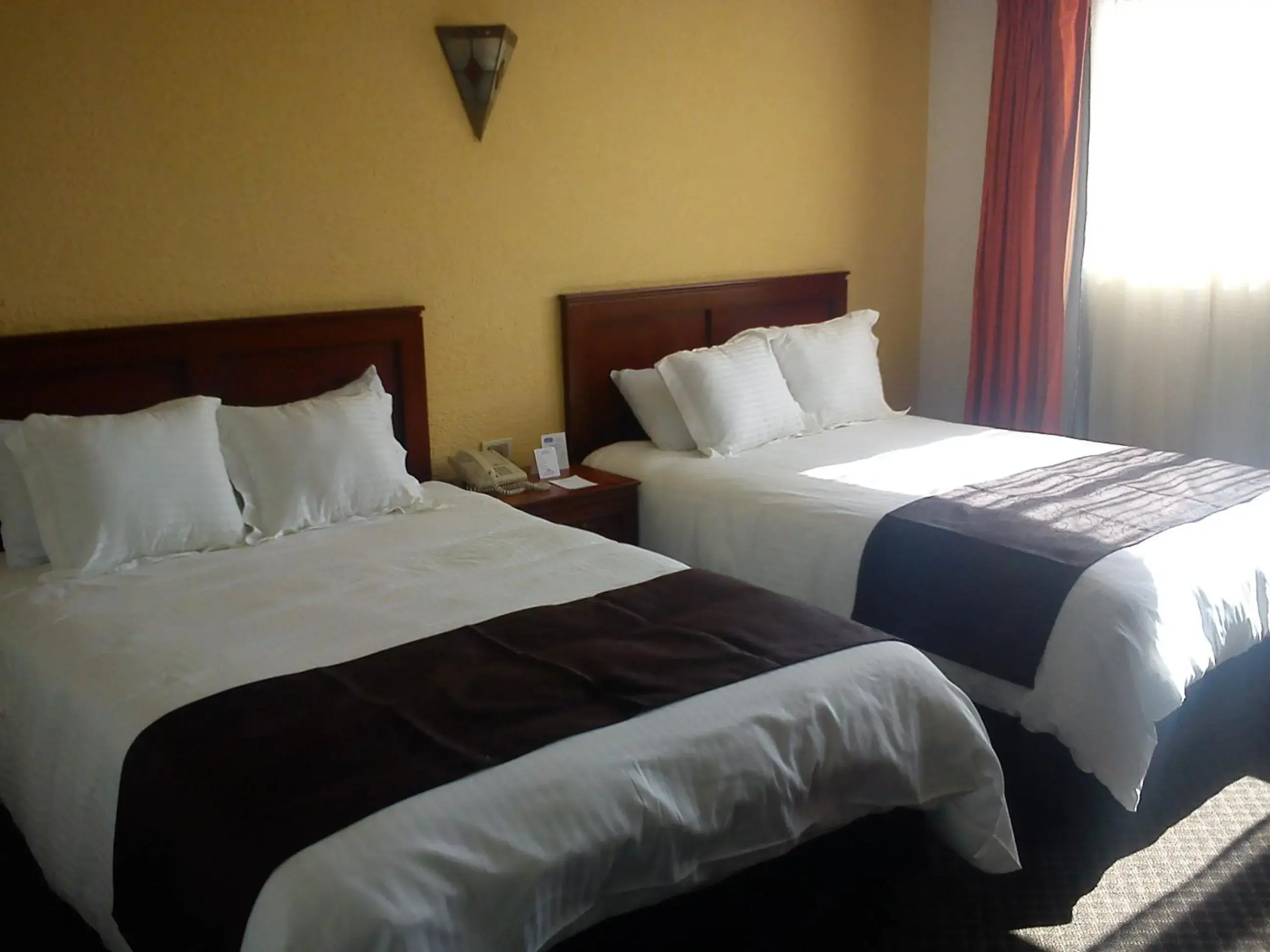 Bedroom, Bed in Howard Johnson Calle Real Morelia